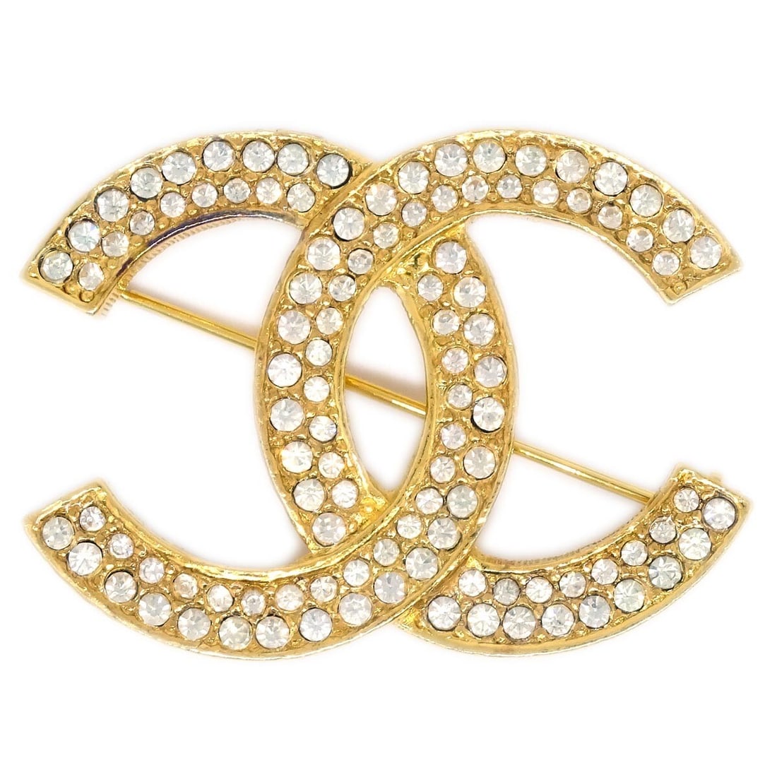 Chanel CC Gold-Plated Brooch Pin with Rhinestones: Chanel CC Gold-Plated Brooch Pin with Rhinestones This exquisite Chanel CC Brooch Pin features a stunning gold-plated finish adorned with sparkling rhinestones. A classic accessory, it showcases the i