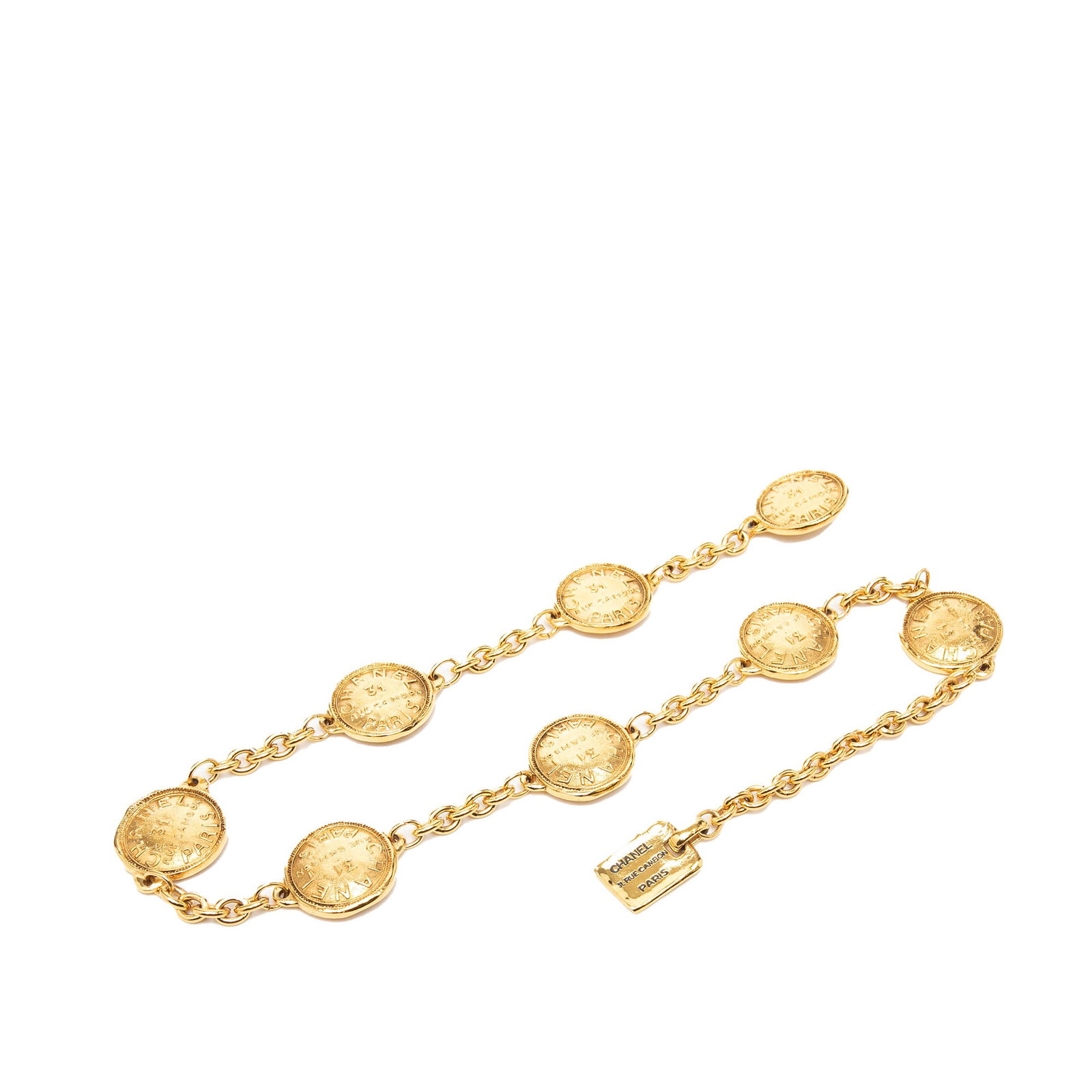 Chanel gold tone medallion chain belt 31 Rue Cambon: Chanel gold tone medallion chain belt 31 Rue Cambon This Chanel CC Gold Plated 31 Rue Cambon Medallion Chain Belt features a gold tone metal body with a signature medallion charm and a hook closure. T