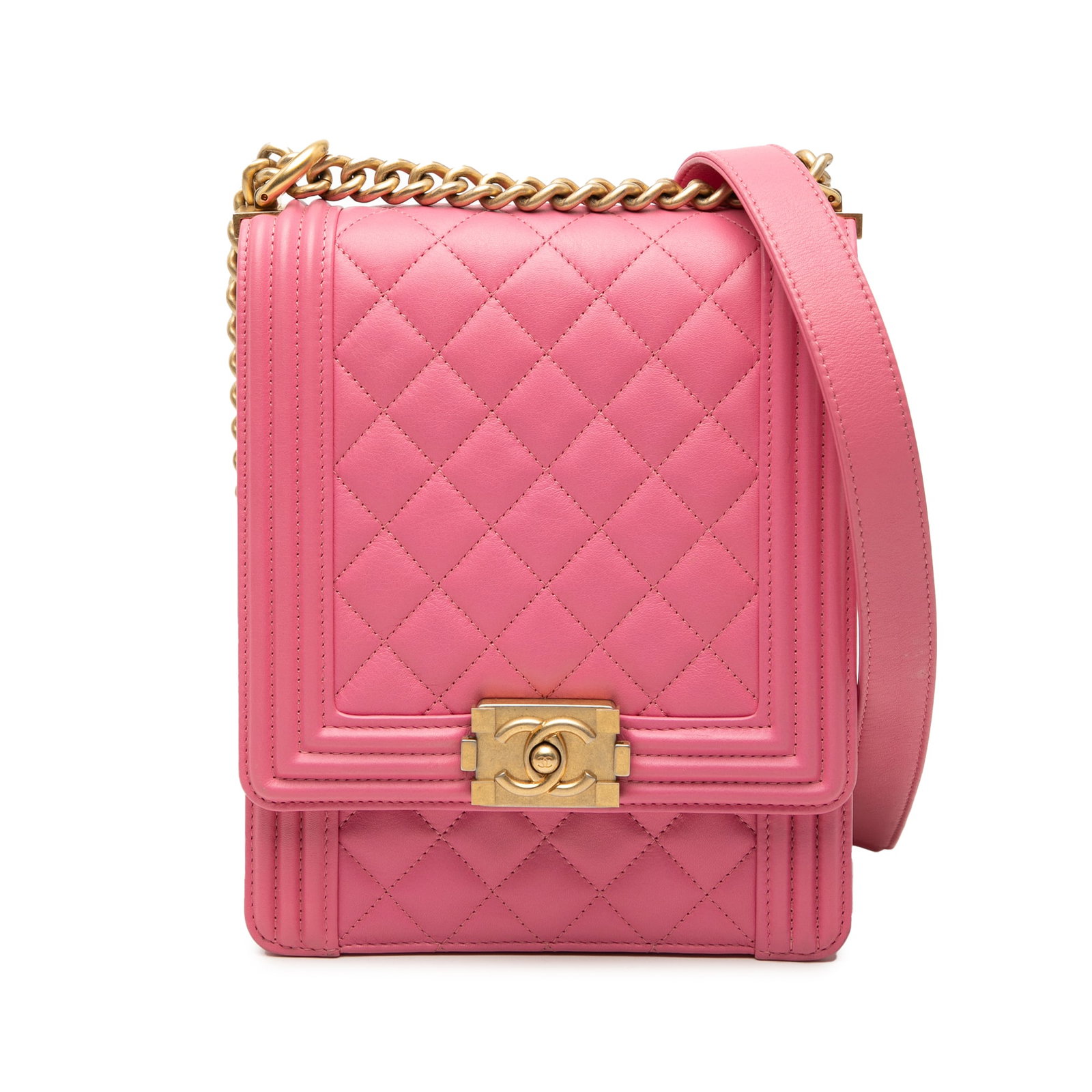 Chanel Boy Flap Pink Quilted Lambskin Shoulder Bag: Chanel Boy Flap Pink Quilted Lambskin Shoulder Bag This Chanel Quilted Lambskin North South Boy Flap bag is crafted from pink lambskin leather and features a signature curb chain strap with a leather 