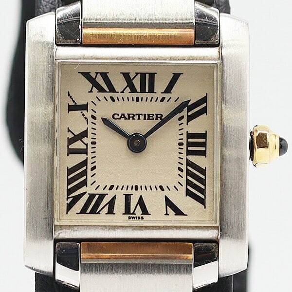 Cartier Tank Francaise Ladies Quartz Watch SS YG Champagne Dial 7213630: Cartier Tank Francaise Ladies Quartz Watch SS YG Champagne Dial 7213630 This Cartier Tank Francaise Small Model wristwatch features a stainless steel and yellow gold case with a champagne dial, design