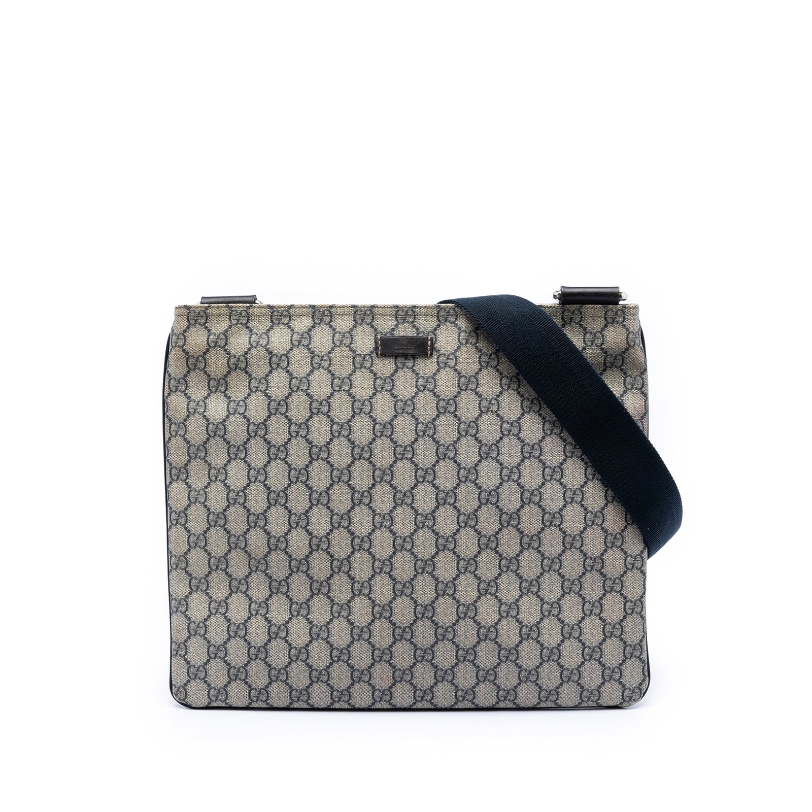 Gucci GG Supreme beige coated canvas crossbody bag: Gucci GG Supreme beige coated canvas crossbody bag This Gucci GG Supreme Crossbody bag features a coated canvas body with leather trim, an adjustable flat shoulder strap, a top zip closure, and an int