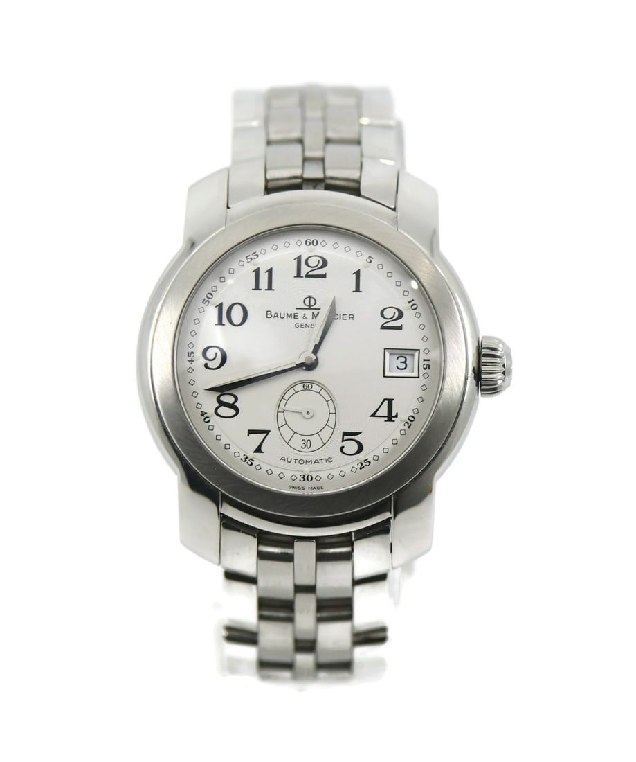 Baume Mercier Capeland automatic steel wristwatch MV045221: Baume Mercier Capeland automatic steel wristwatch MV045221 This Baume & Mercier Capeland wristwatch features a polished stainless steel case and bracelet with a smooth silver bezel. The round analog d