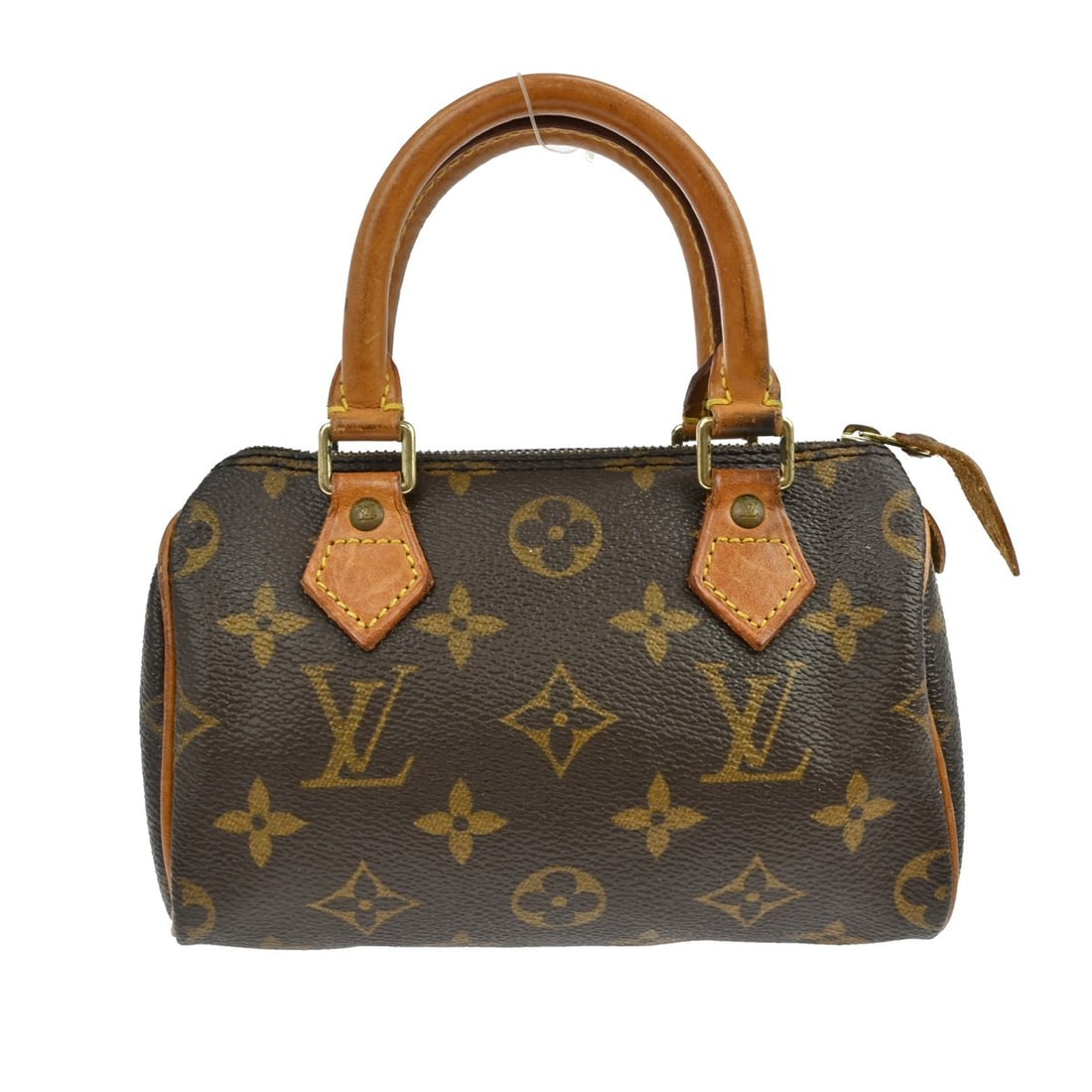 Louis Vuitton Speedy Mini Monogram Canvas Handbag M41534: Louis Vuitton Speedy Mini Monogram Canvas Handbag M41534 This Louis Vuitton Mini Speedy handbag features the iconic monogram canvas leather exterior in brown, complemented by a zip closure and a compa