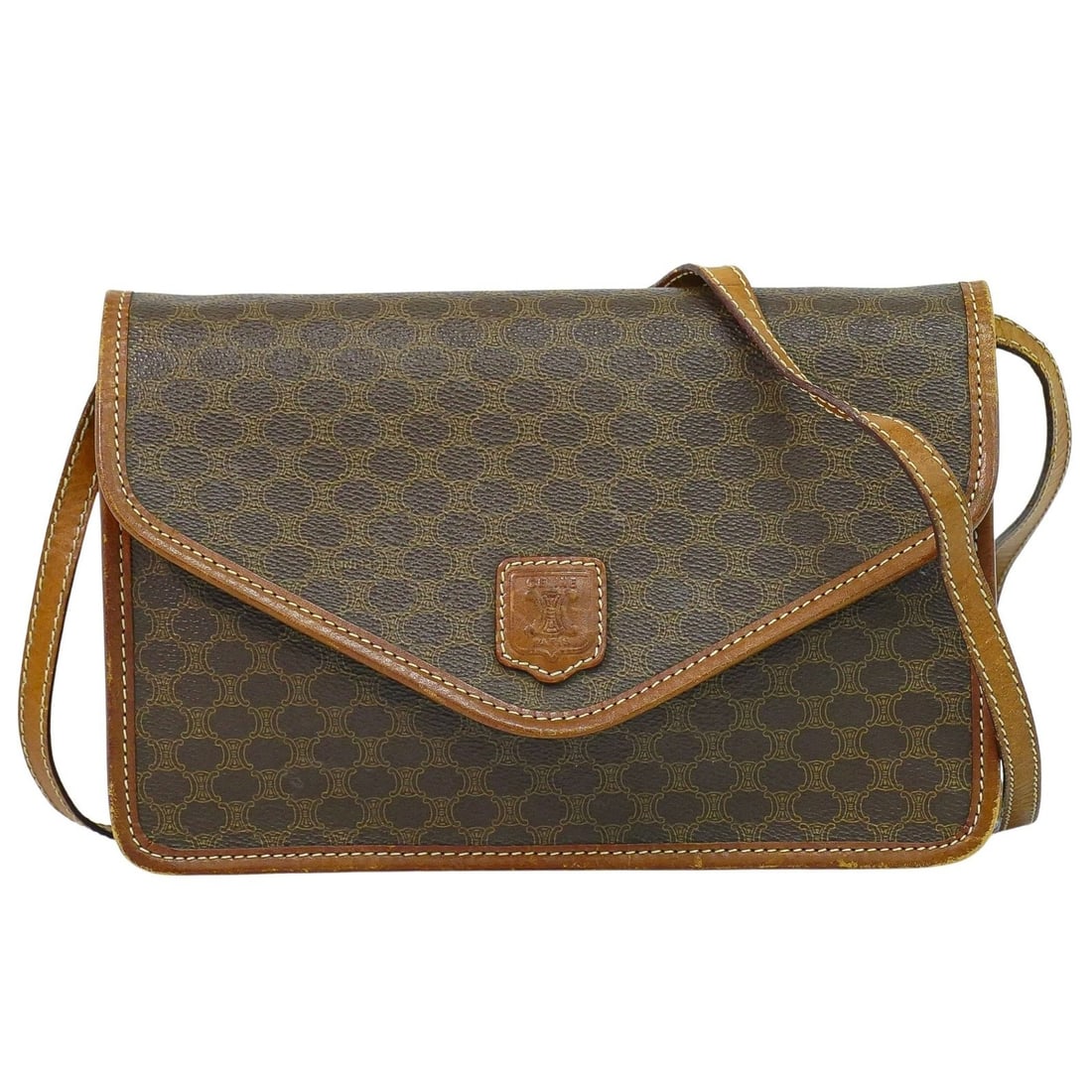 Celine Macadam Brown Canvas and Leather Vintage Shoulder Bag: Celine Macadam Brown Canvas and Leather Vintage Shoulder Bag This Celine Vintage Macadam shoulder bag features brown canvas with leather accents. Designed for women, it showcases the signature Macadam