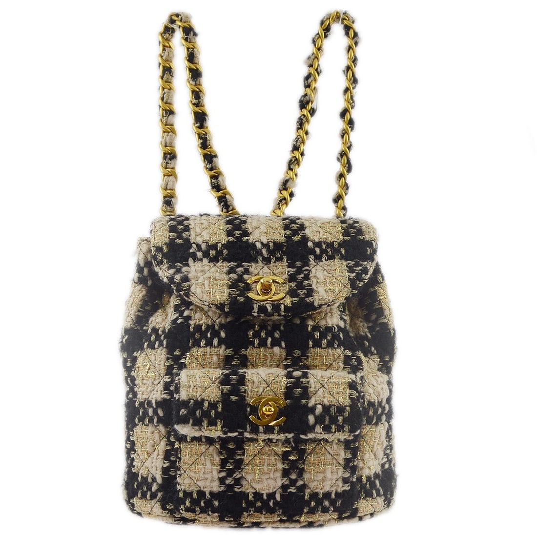 CHANEL Matelasse Tweed Backpack Beige Black Medium: CHANEL Matelasse Tweed Backpack Beige Black Medium This Chanel Duma backpack features a beige and black tweed exterior with a matelasse quilted pattern. The bag is designed with a flap turnlock and dr