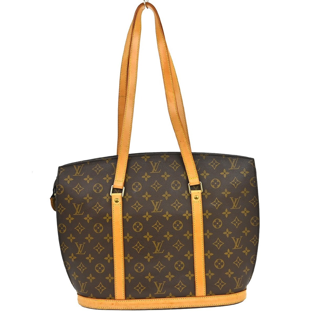 Louis Vuitton Babylone Monogram Canvas Tote 14 in Zip Double Handles: Louis Vuitton Babylone Monogram Canvas Tote 14 in Zip Double Handles This Louis Vuitton Babylone handbag is crafted from signature monogram canvas leather, featuring a classic brown exterior with beig