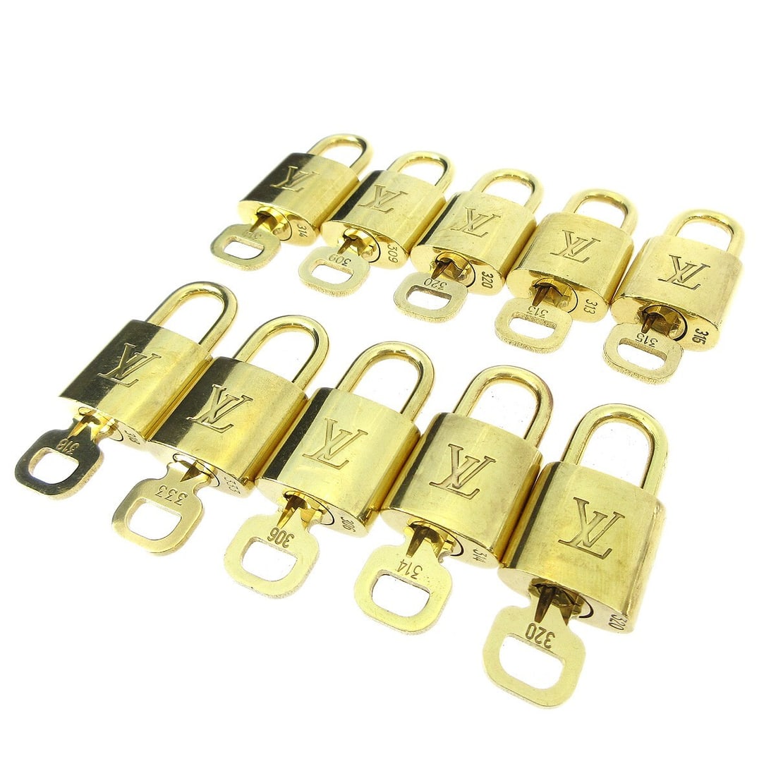 Louis Vuitton gold padlock key charm set 10 pieces: Louis Vuitton gold padlock key charm set 10 pieces This is a set of 10 Louis Vuitton padlock and key bag accessory charms in gold. Designed for unisex use, these padlocks feature the iconic Louis Vuit