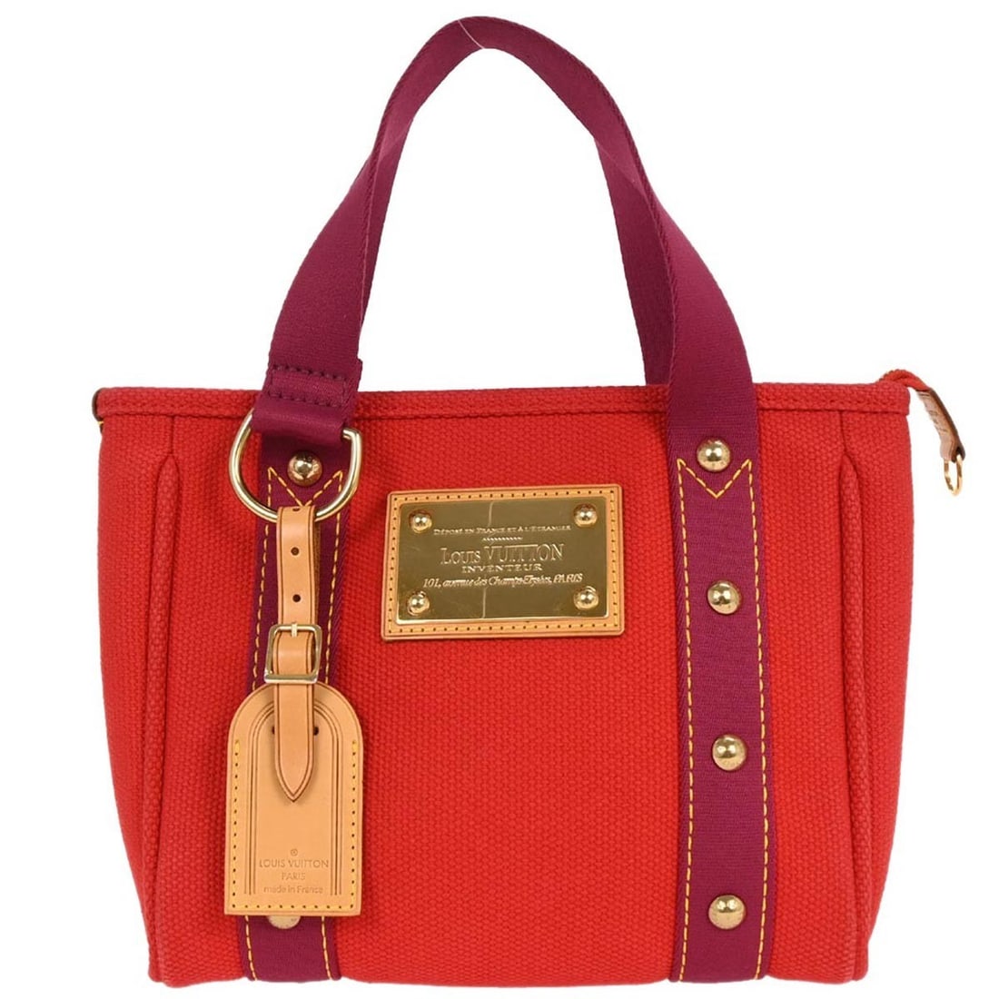 Louis Vuitton Antigua Cabas PM red purple canvas tote bag: Louis Vuitton Antigua Cabas PM red purple canvas tote bag This Louis Vuitton Antigua Cabas PM tote bag features a vibrant red canvas exterior with purple double handles and a zip closure. The medium-s