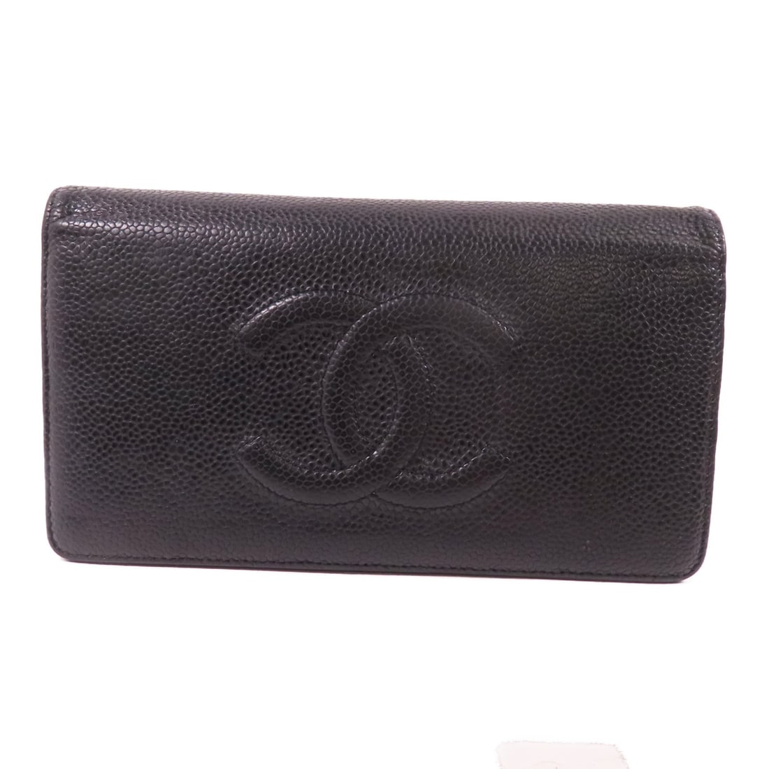 Chanel Black Calfskin Bifold Long Wallet with Silver CC Logo: Chanel Black Calfskin Bifold Long Wallet with Silver CC Logo This CHANEL long bifold wallet is crafted from black calfskin leather, offering a classic and elegant accessory. The wallet features the ic