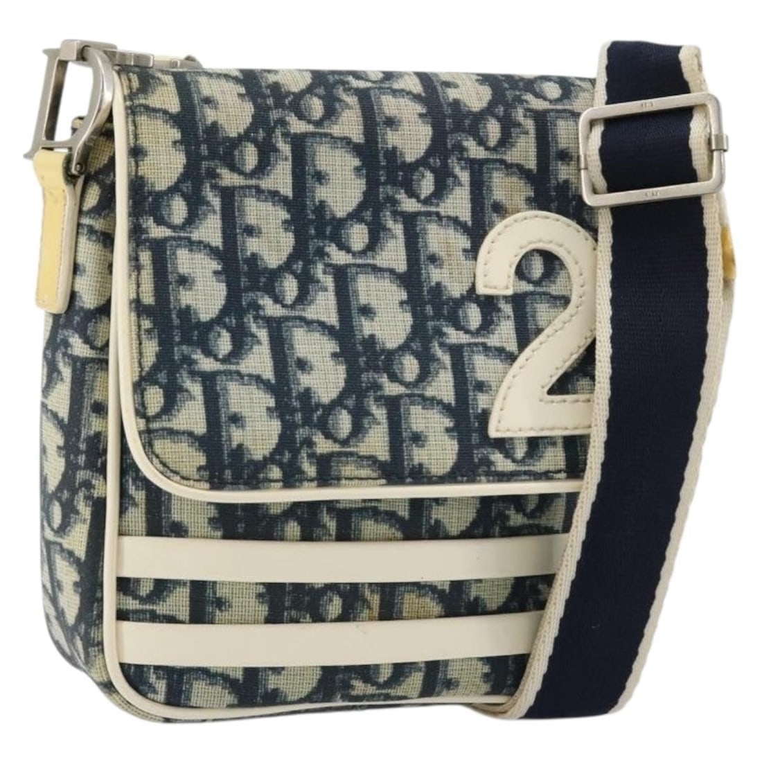Christian Dior Trotter Canvas Navy Silver Shoulder Bag: Christian Dior Trotter Canvas Navy Silver Shoulder Bag This Christian Dior Trotter Canvas and PVC Leather Shoulder Bag features a navy and silver color scheme and is designed for women. The bag is mad