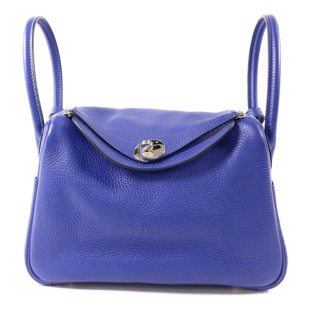 Hermes Lindy 26 Bleu Electrique 2 Way Shoulder Bag: Hermes Lindy 26 Bleu Electrique 2 Way Shoulder Bag This Hermes Lindy 26 is a versatile 2-way shoulder bag crafted from Clemence calfskin leather in a striking Bleu Electrique color. Made in France, it