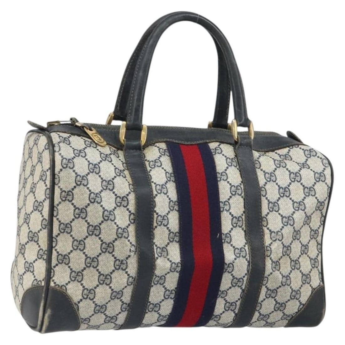Gucci GG Supreme Sherry Line Navy PVC Leather Handbag from Italy: Gucci GG Supreme Sherry Line Navy PVC Leather Handbag from Italy This is a Gucci GG Supreme Sherry Line handbag crafted from navy and gold PVC leather with GG canvas accents. The bag features dual han
