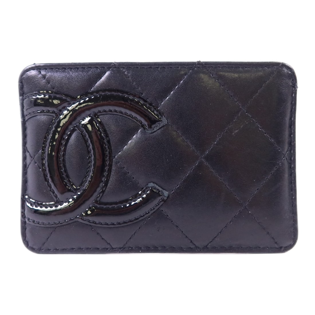 CHANEL Cambon Black Calfskin Card Case: CHANEL Cambon Black Calfskin Card Case This CHANEL Cambon card case is crafted from black calfskin leather and features the iconic CC logo. Designed for women, it offers a compact and stylish way to o