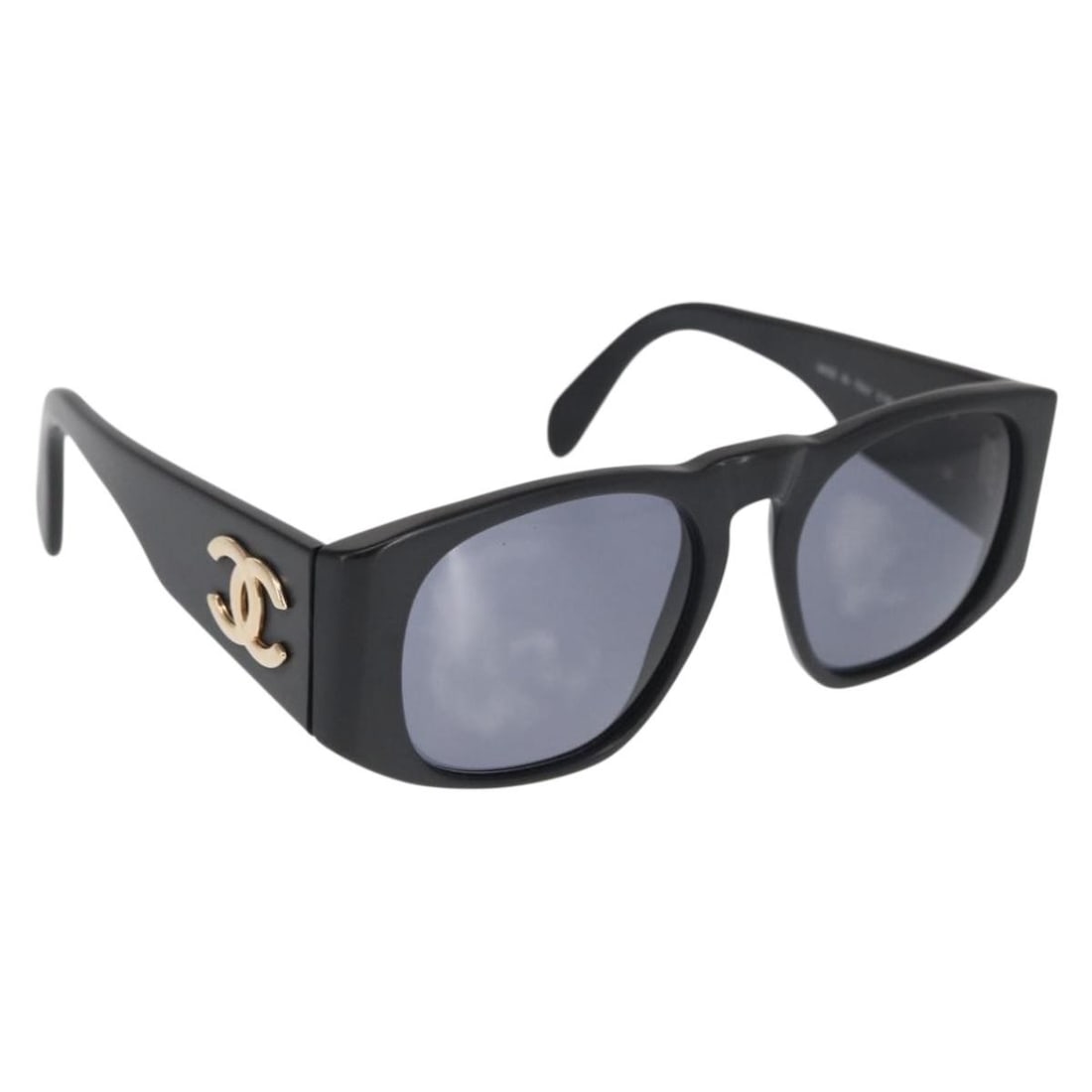 Black Plastic CHANEL Sunglasses with CC Logo and Case: Black Plastic CHANEL Sunglasses with CC Logo and Case These CHANEL sunglasses feature a stylish black plastic frame with the iconic CC logo. Made in Italy, they offer a classic look and come with a pr
