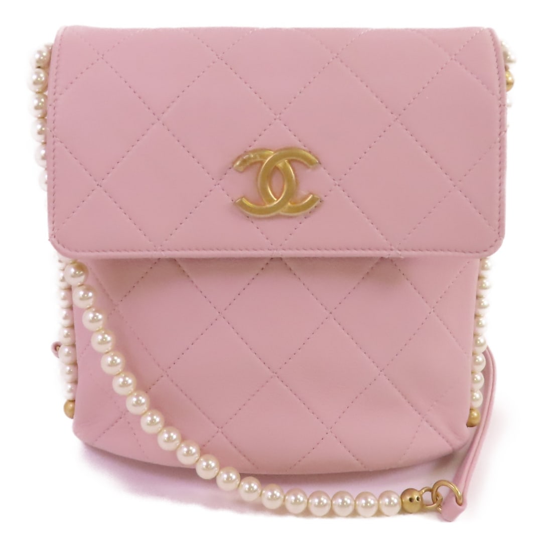 Pink Calfskin Leather Chanel Shoulder Bag with CC Gold Hardware: Pink Calfskin Leather Chanel Shoulder Bag with CC Gold Hardware This CHANEL shoulder bag features pink calfskin leather with signature CC detailing and a gold tone chain. Crafted in France, it offers 
