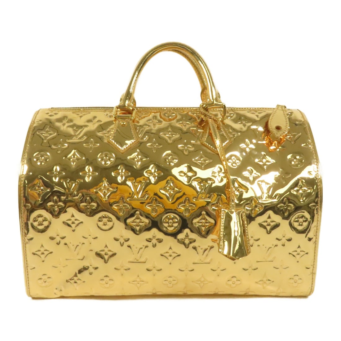 Louis Vuitton Monogram Miroir Speedy 35 Gold Handbag: Louis Vuitton Monogram Miroir Speedy 35 Gold Handbag This Louis Vuitton Monogram Miroir Speedy 35 is a hand-sewn handbag crafted with a gold exterior and features the brand's signature monogram design