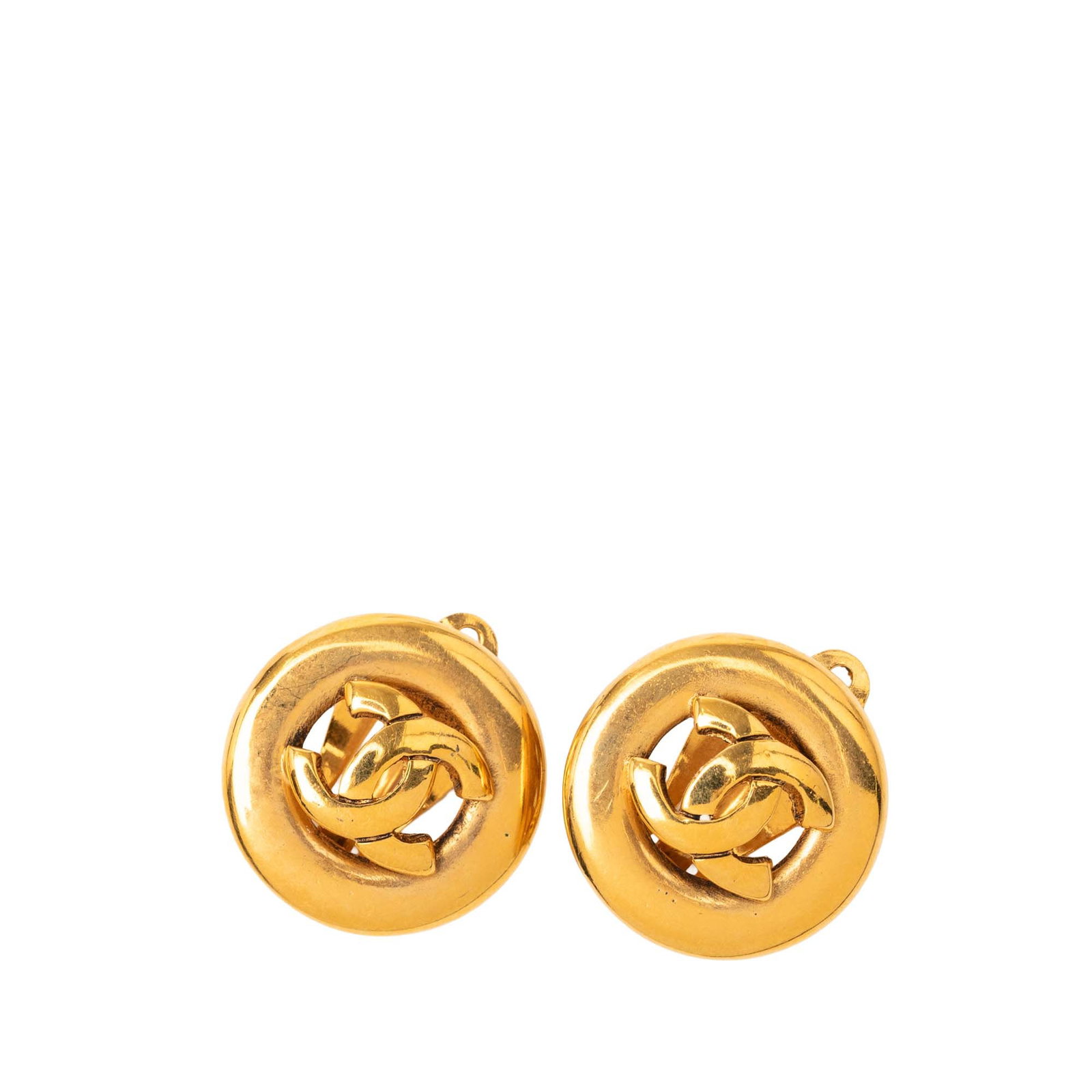 Chanel Round Gold Plated Clip Earrings CC Logo France: Chanel Round Gold Plated Clip Earrings CC Logo France These Chanel CC round clip-on earrings are crafted from gold plated metal, featuring a classic design with back clip-on closures. Made in France, 