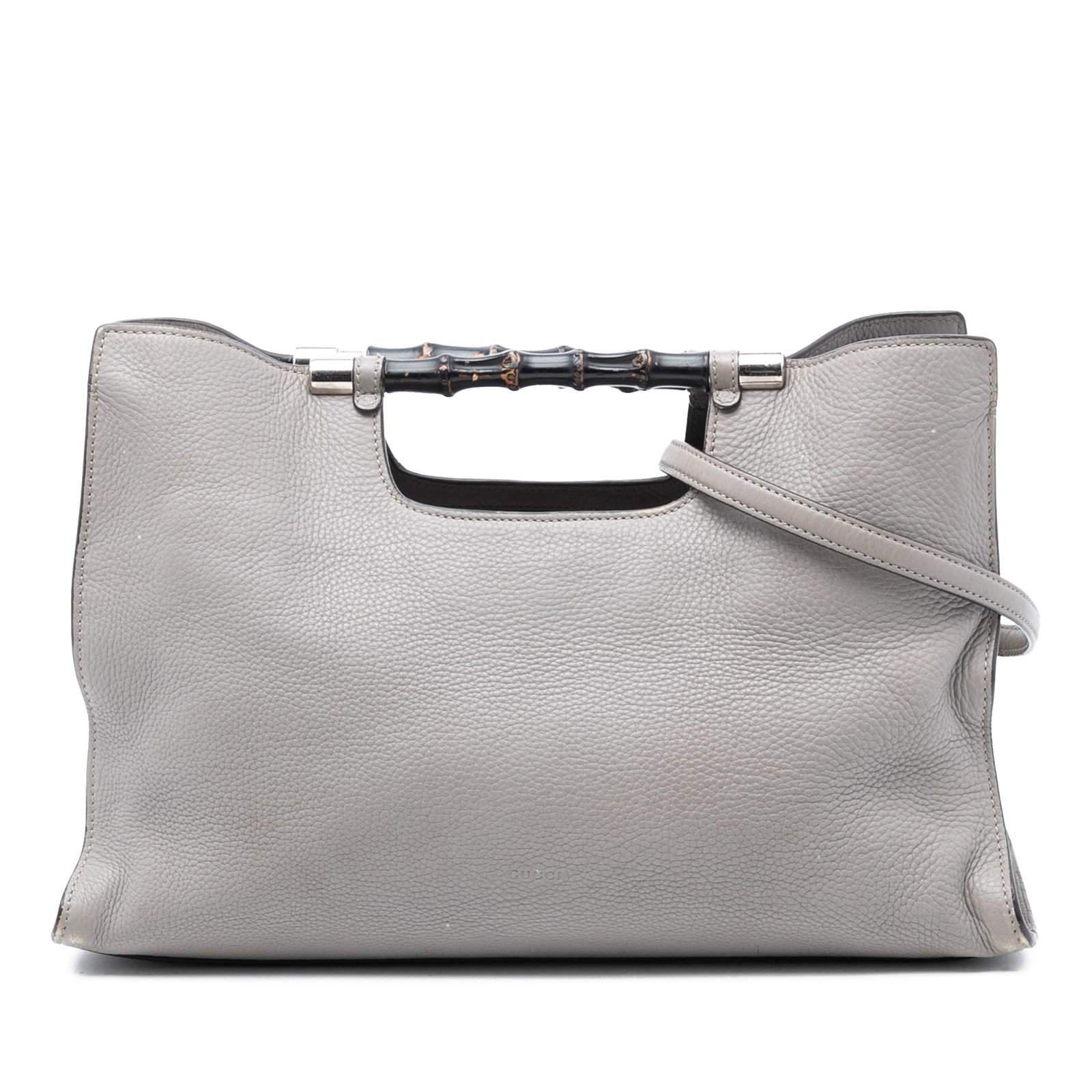 Gucci Bamboo Handle Medium Gray Leather Satchel with Shoulder Strap: Gucci Bamboo Handle Medium Gray Leather Satchel with Shoulder Strap This satchel showcases a leather body with distinctive bamboo handles and a detachable flat leather shoulder strap. It features an o