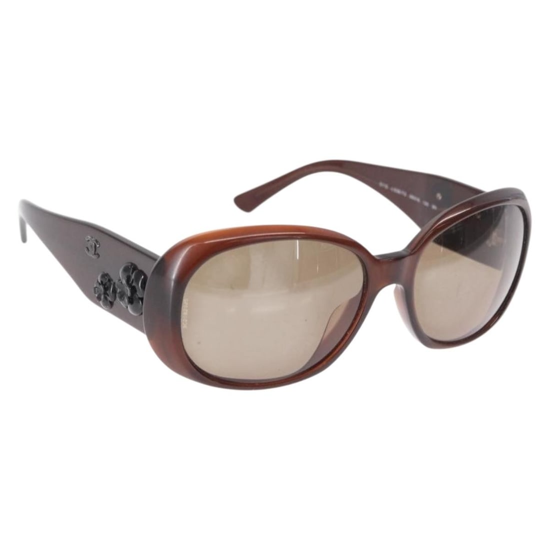 Chanel Camelia Brown Plastic Women's Sunglasses Italy: Chanel Camelia Brown Plastic Women's Sunglasses Italy Chanel Camelia sunglasses feature a brown plastic frame designed for women. This pre-owned pair is in good condition, displaying signs of use such