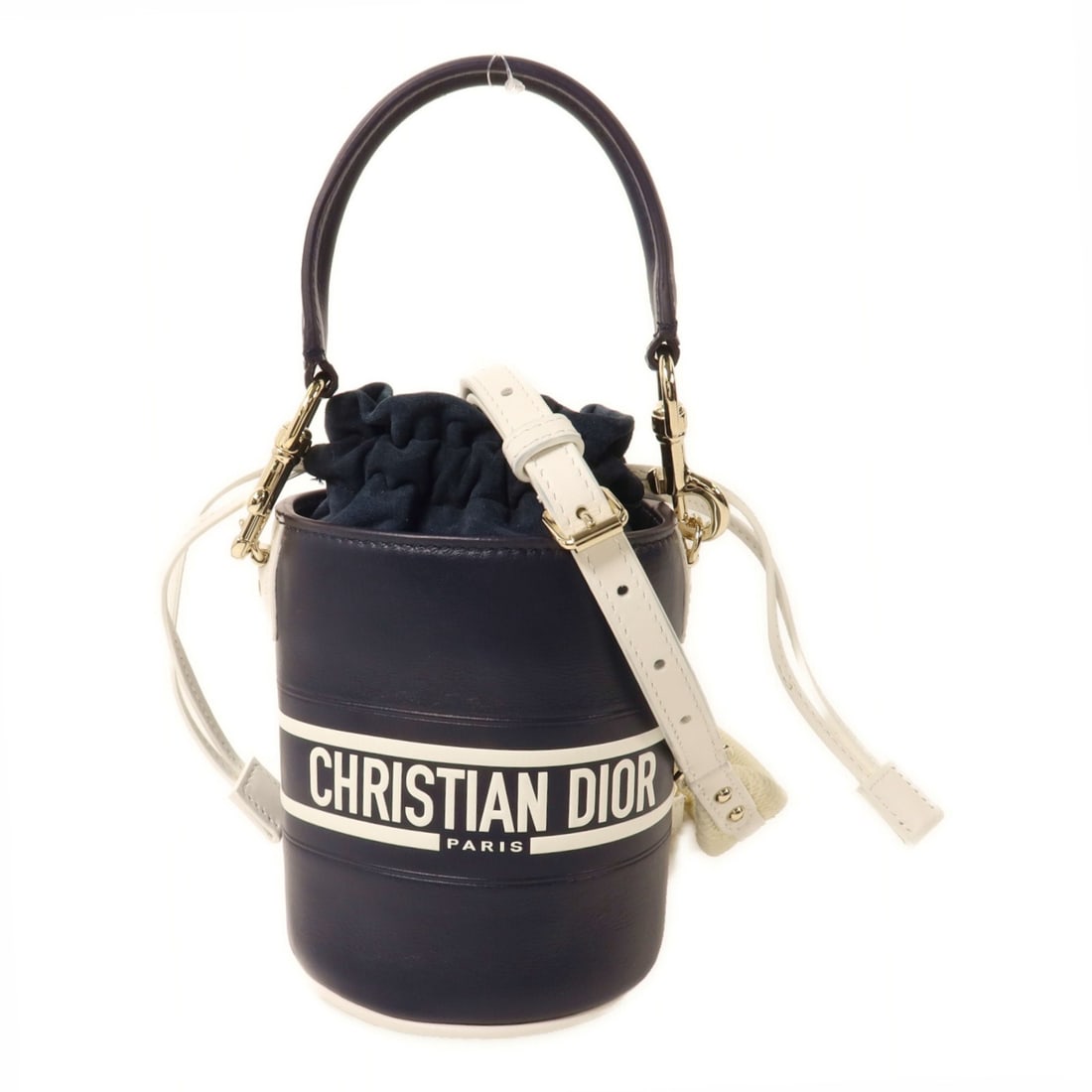 Dior Vibe Micro Bucket Bag Calfskin Navy White GHW: Dior Vibe Micro Bucket Bag Calfskin Navy White GHW This Christian Dior Vibe Micro Bucket Bag features a structured 2-way design that can be worn as a shoulder bag. Crafted from navy and white calfskin