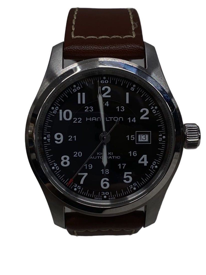Hamilton Khaki Field Auto Swiss Leather Wristwatch: Hamilton Khaki Field Auto Swiss Leather Wristwatch This Hamilton Khaki Field Auto H706050 men's wristwatch features a black dial and a durable leather band. Made in Switzerland, the watch is designed 