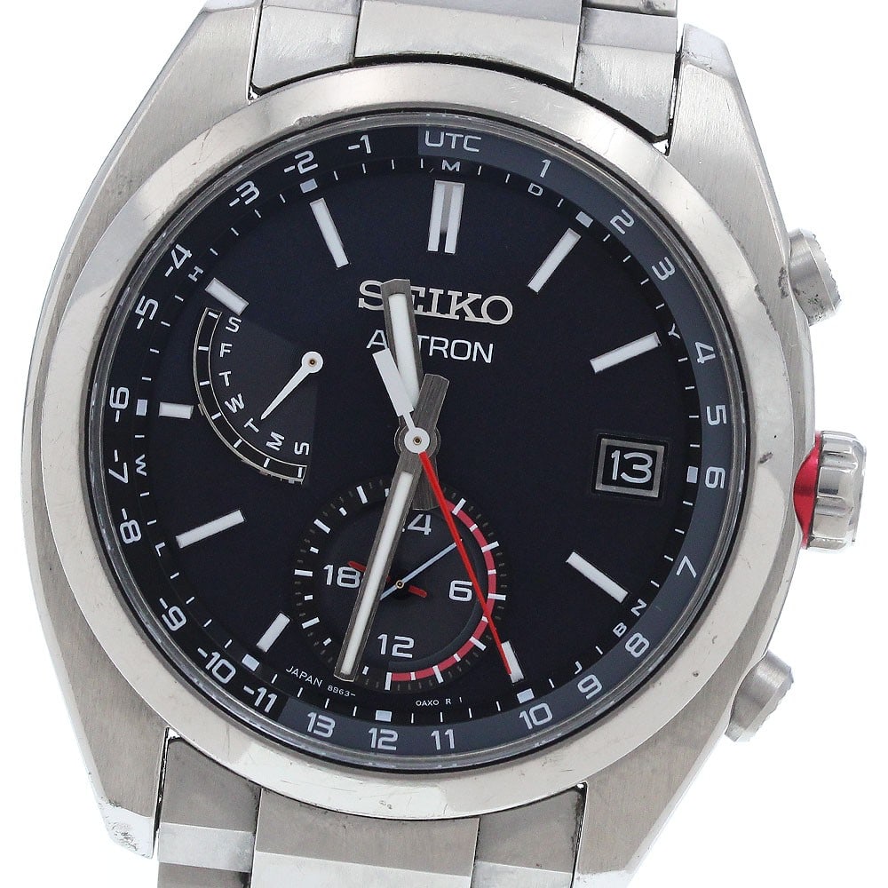 Seiko Astron Titanium Solar Radio Controlled Day Date Watch SBXY017: Seiko Astron Titanium Solar Radio Controlled Day Date Watch SBXY017 This Seiko Astron Day Date men's wristwatch, model SBXY017/8B63-0BA0, features a titanium case and bracelet with a black dial. It is