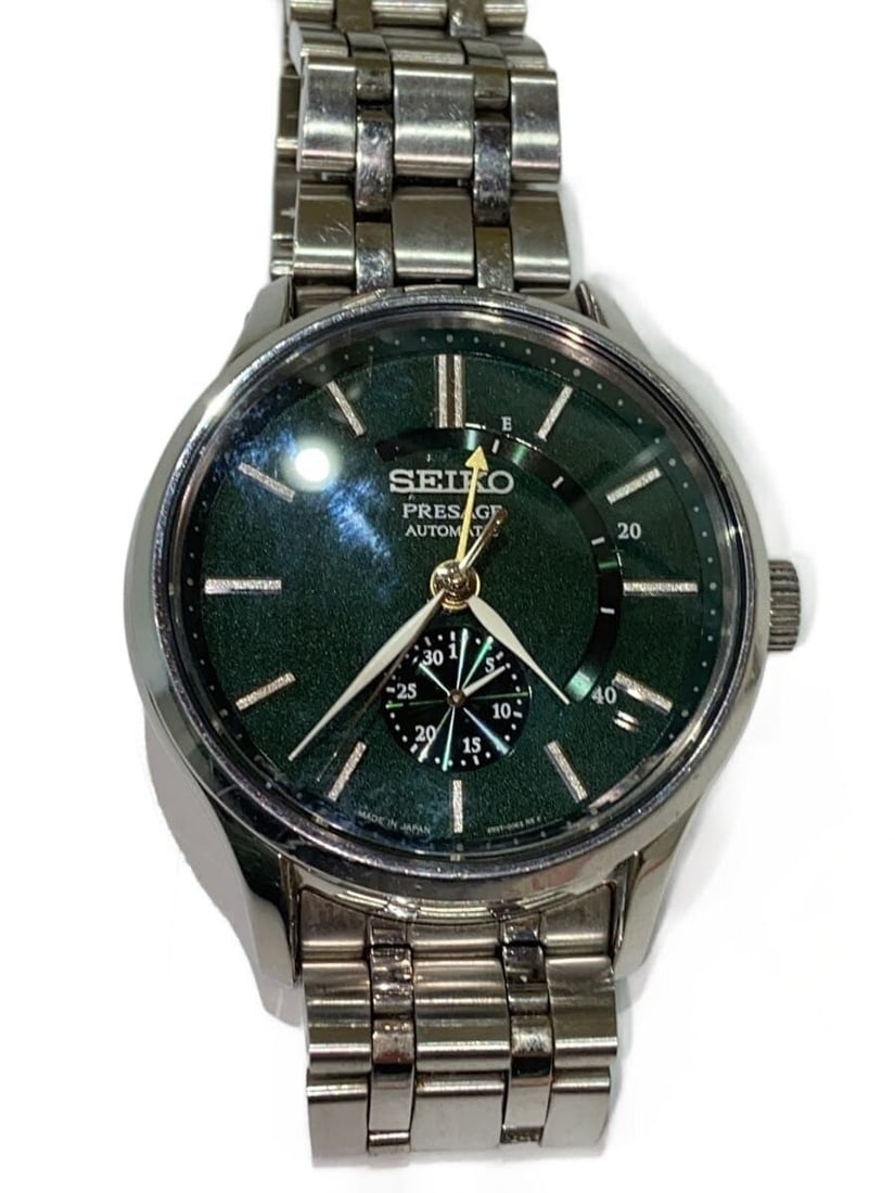Seiko Presage Green Dial Men's Wristwatch 4R57-00N0: Seiko Presage Green Dial Men's Wristwatch 4R57-00N0 This SEIKO Presage 4R57-00N0 men's wristwatch features a green dial and is crafted in Japan. The watch is pre-owned and displays slight signs of use
