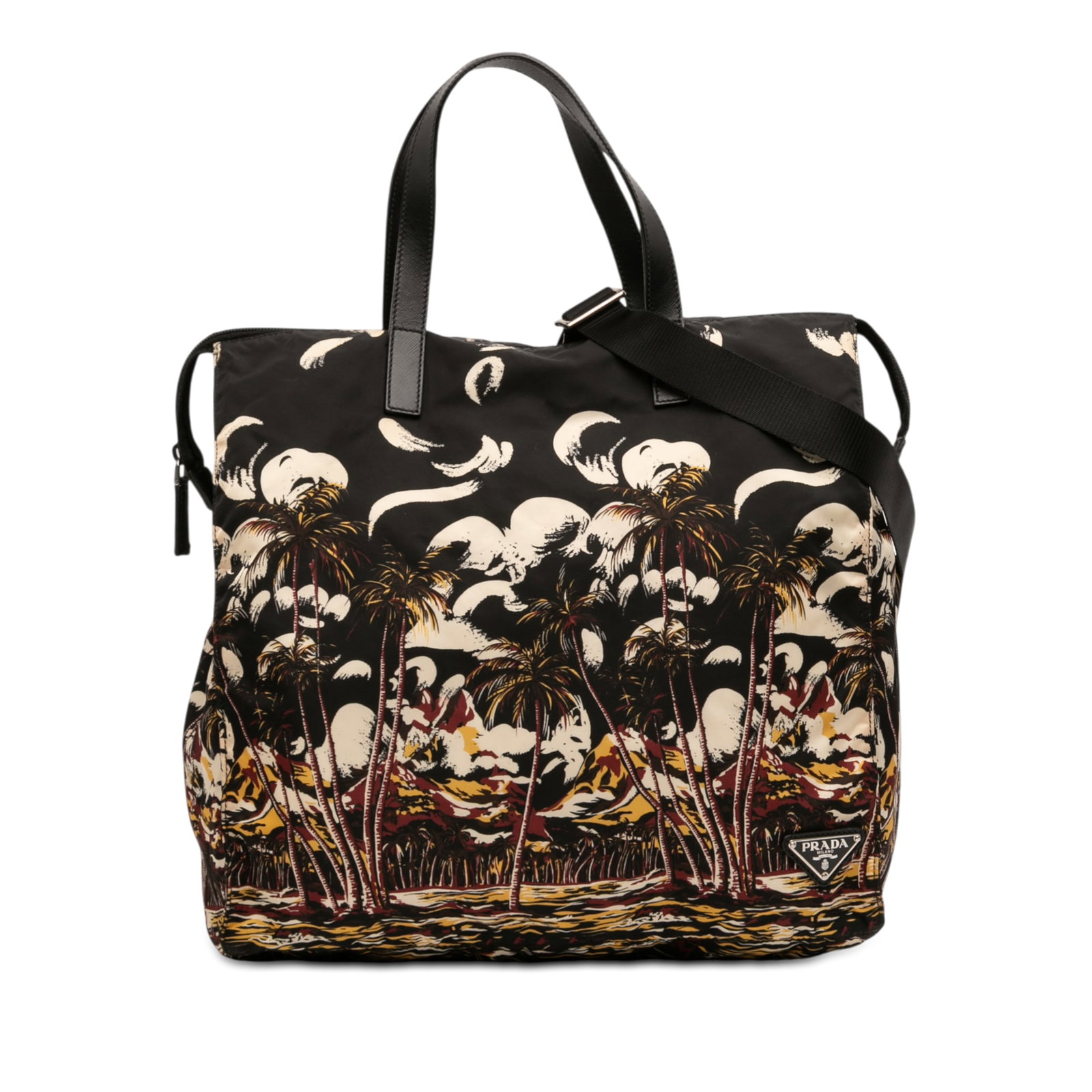 Prada Tessuto Stampato Printed Nylon Satchel with Leather Handles: Prada Tessuto Stampato Printed Nylon Satchel with Leather Handles This Prada Tessuto Stampato Satchel features a printed nylon body with flat leather handles and a detachable flat strap. It is designe