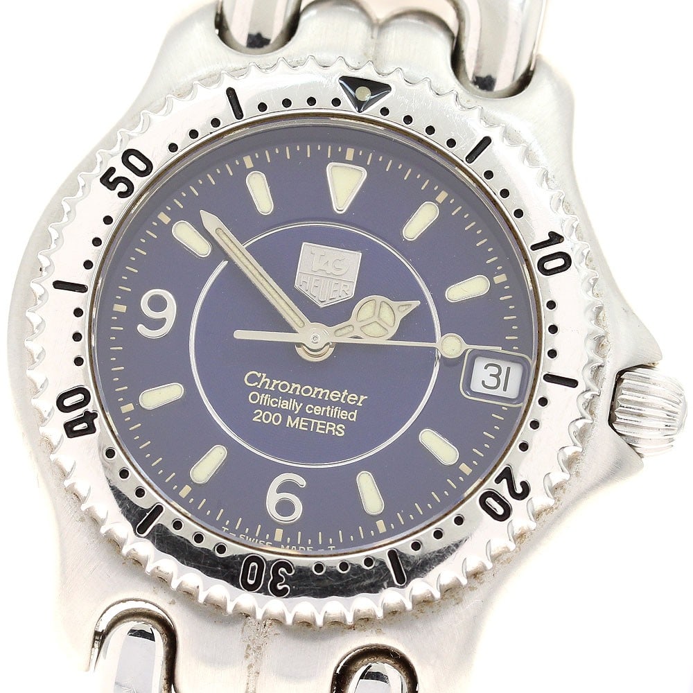 TAG Heuer Cell Date Automatic Stainless Steel Wristwatch WG5214-P0: TAG Heuer Cell Date Automatic Stainless Steel Wristwatch WG5214-P0 This TAG HEUER WG5214-P0 Cell Date Chronometer is a unisex wristwatch crafted in Switzerland. Featuring a stainless steel case and br