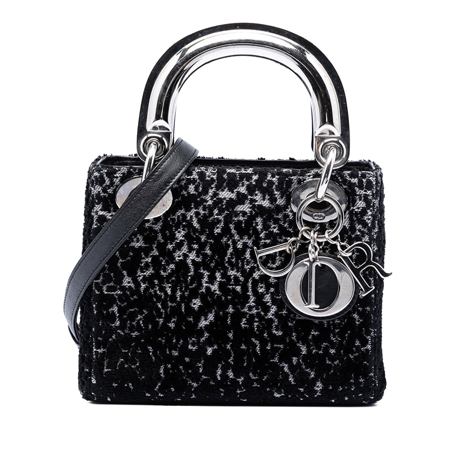 Dior Mini Fabric Lame Lady bag with leather strap: Dior Mini Fabric Lame Lady bag with leather strap This Mini Fabric Lame Lady Dior handbag features a black synthetic fiber body, flat top handles, and a detachable flat leather strap for versatile car