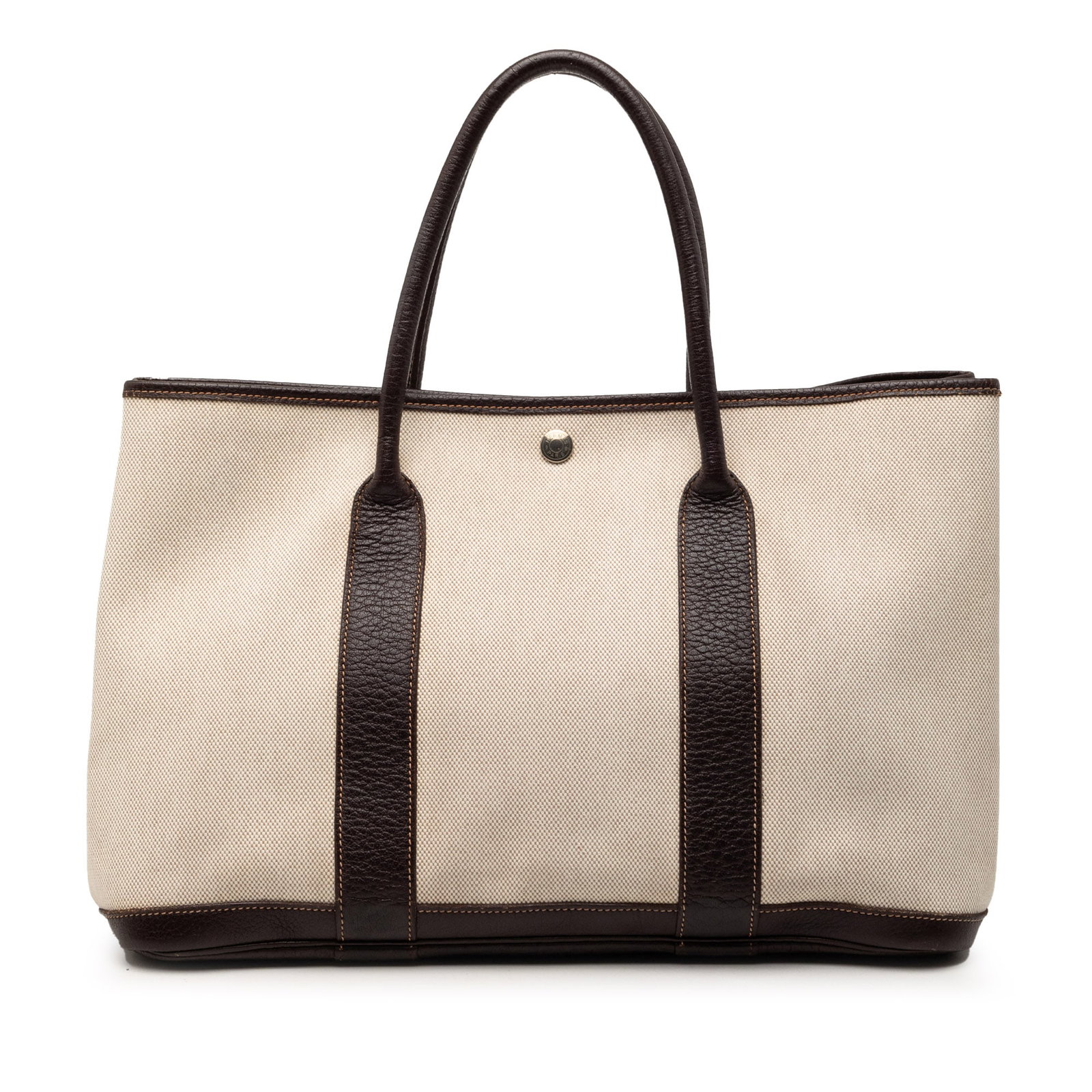 Toile and Negonda Leather Trim Garden Party 36 Tote Bag by Hermes: Toile and Negonda Leather Trim Garden Party 36 Tote Bag by Hermes This Hermes Garden Party 36 features a beige canvas body with Negonda leather trim and rolled leather handles. The bag has an open top