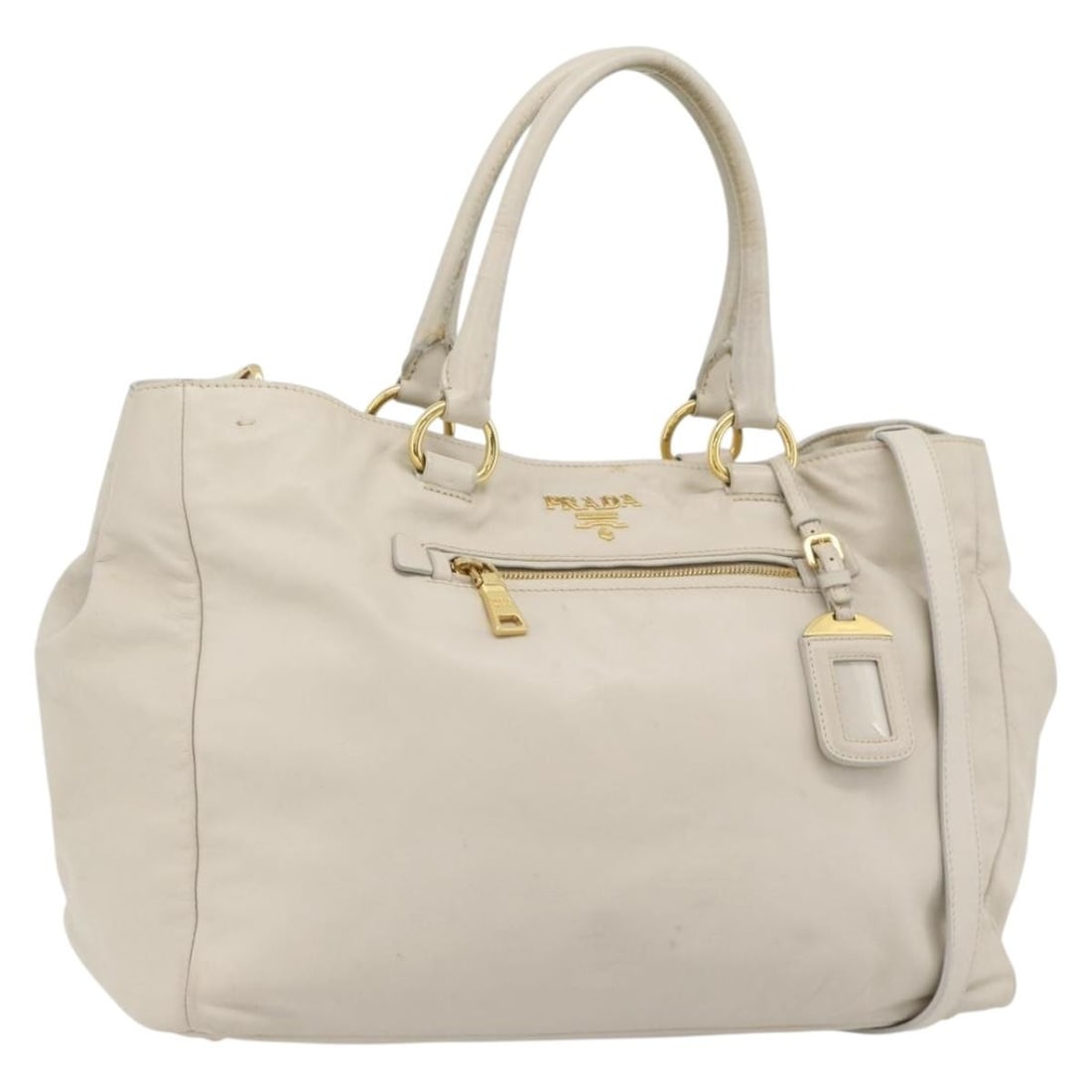 Prada Ivory Gold Leather 2way Shoulder Bag with Strap and Card: Prada Ivory Gold Leather 2way Shoulder Bag with Strap and Card This PRADA 2-way handbag is crafted from leather in an ivory and gold color combination, offering versatile carrying options with both ha