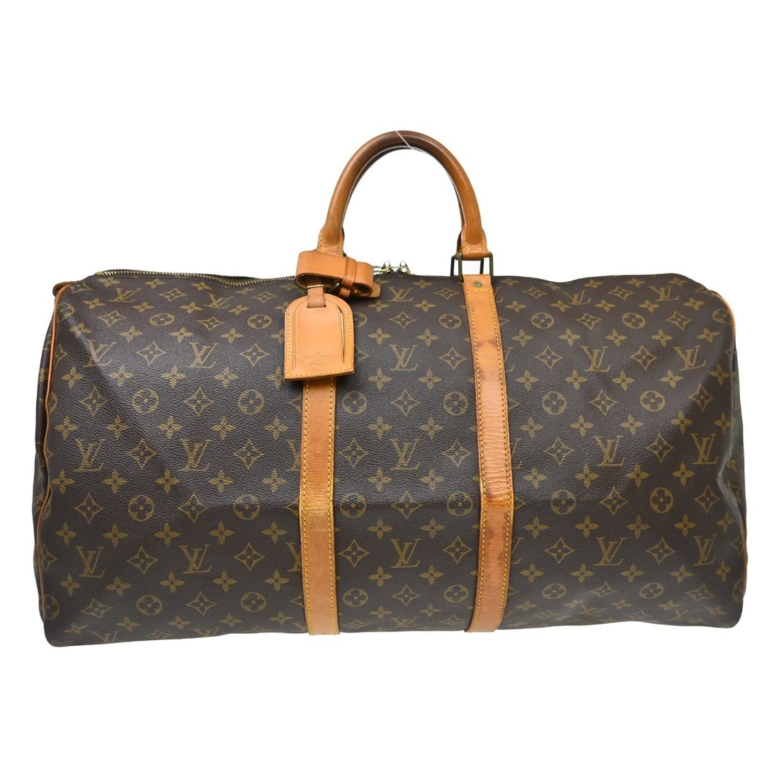 Louis Vuitton Keepall 55 monogram duffle travel bag: Louis Vuitton Keepall 55 monogram duffle travel bag This Louis Vuitton Keepall 55 is a vintage extra-large duffle bag crafted from the brand's signature monogram canvas leather. Designed for travel, i