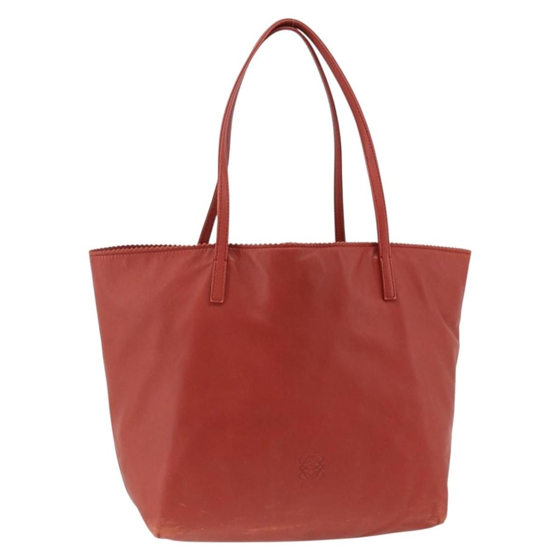 LOEWE Red Leather Anagram Tote Bag Spain: LOEWE Red Leather Anagram Tote Bag Spain This LOEWE Anagram tote bag is crafted from red and silver leather and features a spacious design suitable for everyday use. The bag is made in Spain and inclu