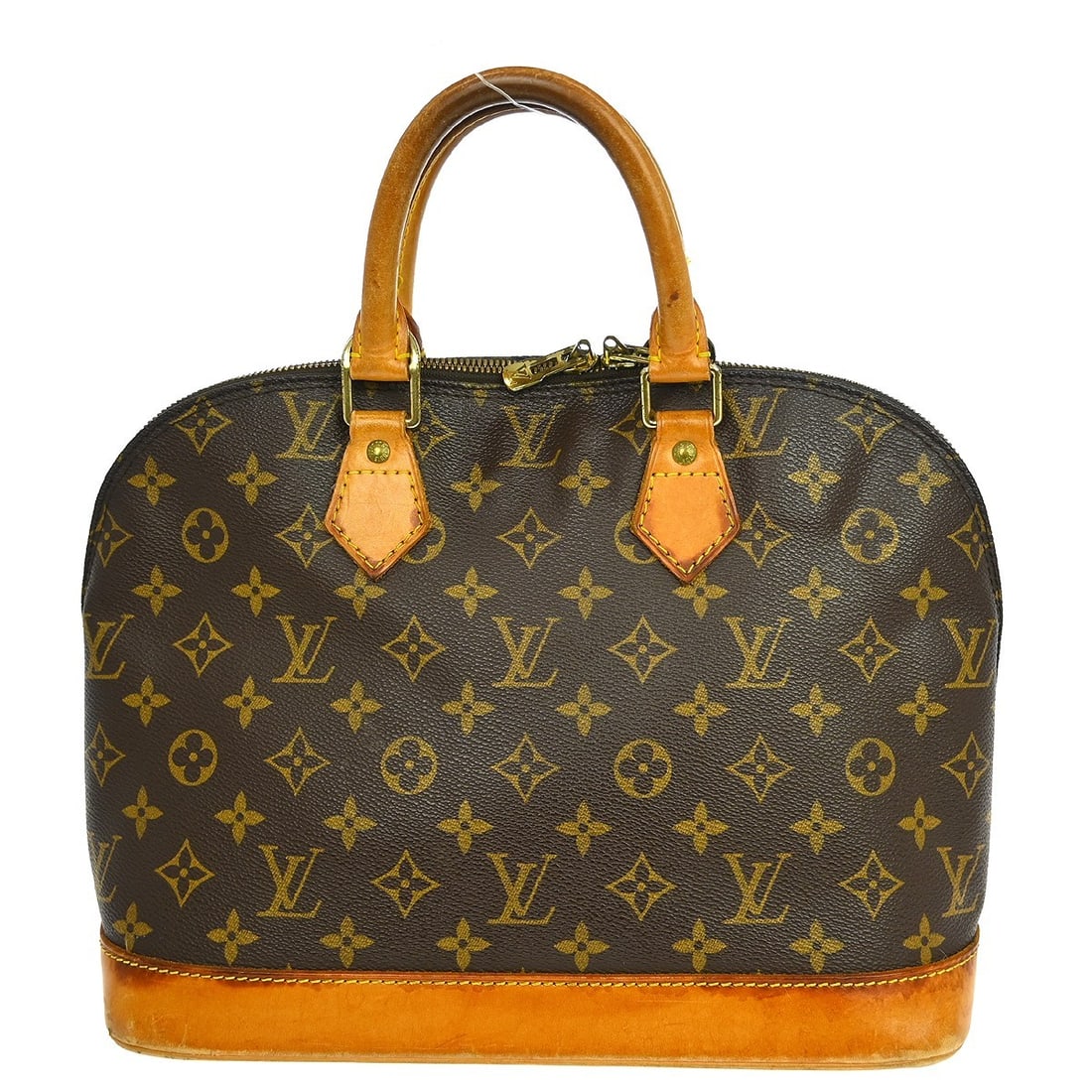 Louis Vuitton Monogram Alma Brown Canvas Handbag: Louis Vuitton Monogram Alma Brown Canvas Handbag This Louis Vuitton Alma handbag features the iconic monogram canvas exterior with beige double handles and a zip closure. The bag is medium-sized and d