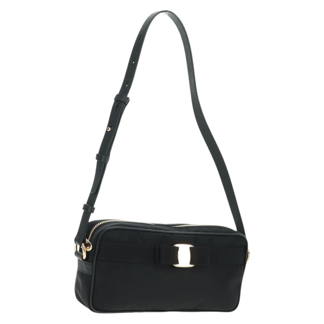 Black Nylon Shoulder Purse by Salvatore Ferragamo with Dust Bag: Black Nylon Shoulder Purse by Salvatore Ferragamo with Dust Bag This Salvatore Ferragamo shoulder bag features a sleek black nylon exterior with gold-tone accents. The compact design offers practical 
