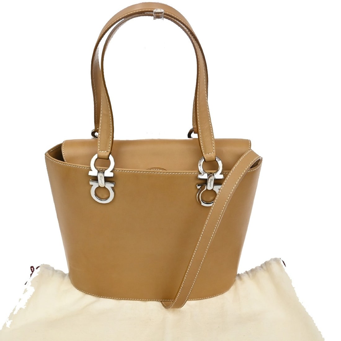 Gancini Leather Shoulder Bag by Salvatore Ferragamo Brown: Gancini Leather Shoulder Bag by Salvatore Ferragamo Brown This Salvatore Ferragamo Gancini shoulder bag is crafted from brown leather and designed for women. It features a spacious interior and signat