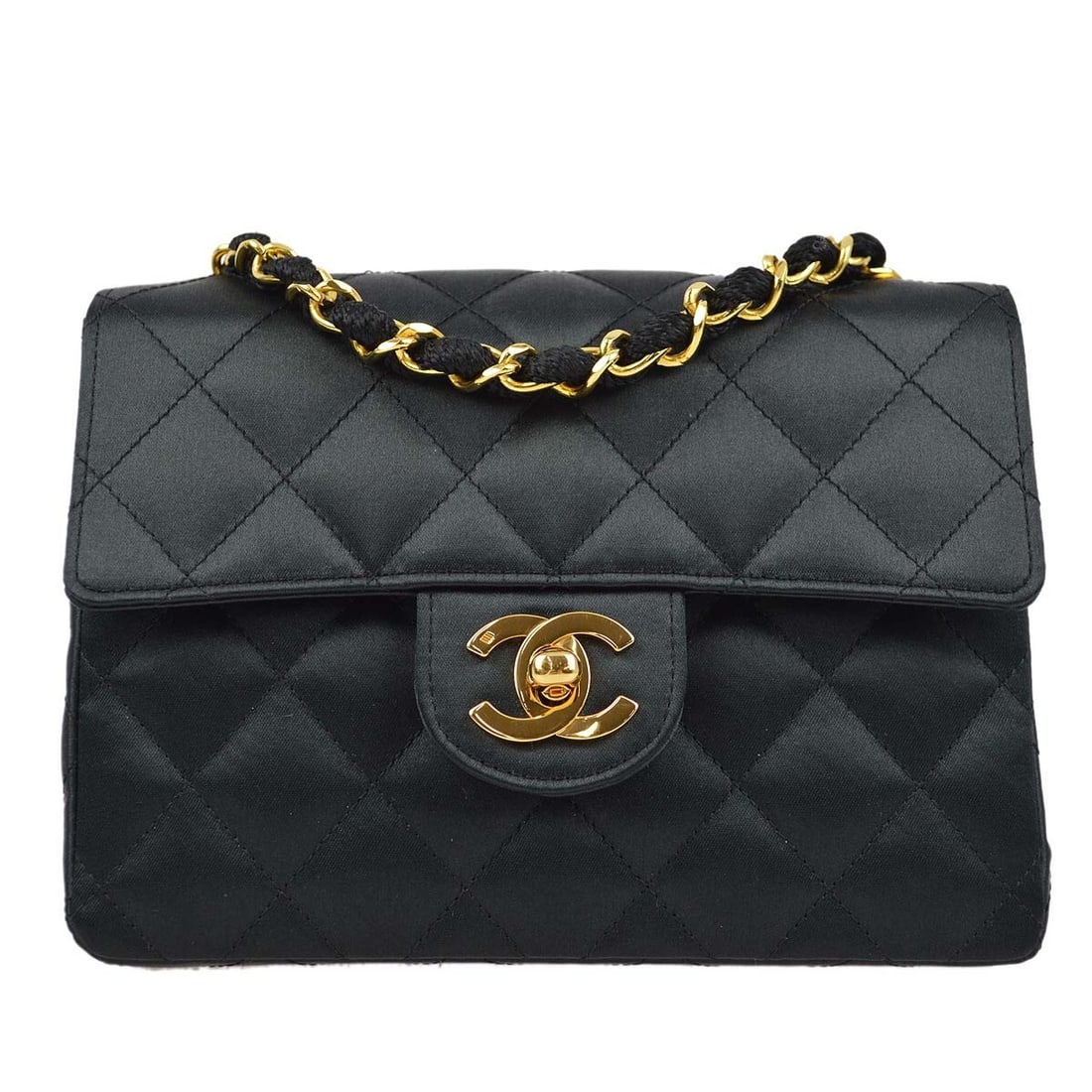 CHANEL Classic Flap black satin mini shoulder bag chain strap: CHANEL Classic Flap black satin mini shoulder bag chain strap This Chanel Mini Classic Square Flap Shoulder Bag features a black satin exterior with a quilted matelasse pattern. Designed with a flap t