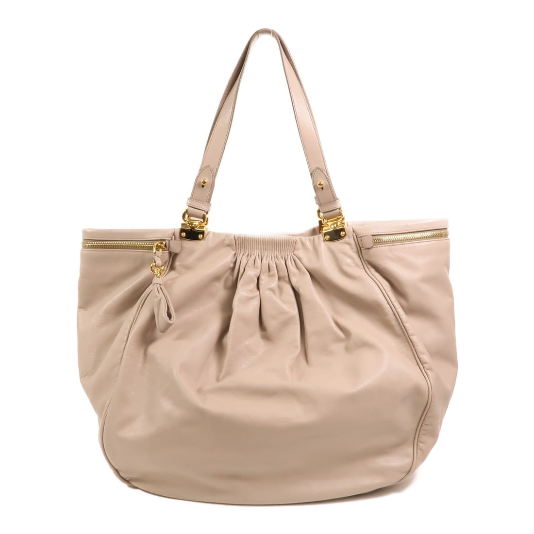 Miu Miu Vitello Lux Gray Calfskin Hobo Tote with Gold Hardware: Miu Miu Vitello Lux Gray Calfskin Hobo Tote with Gold Hardware This Miu Miu Vitello Lux Hobo Tote Bag is crafted from gray calfskin leather and features gold-tone hardware. With a spacious interior an