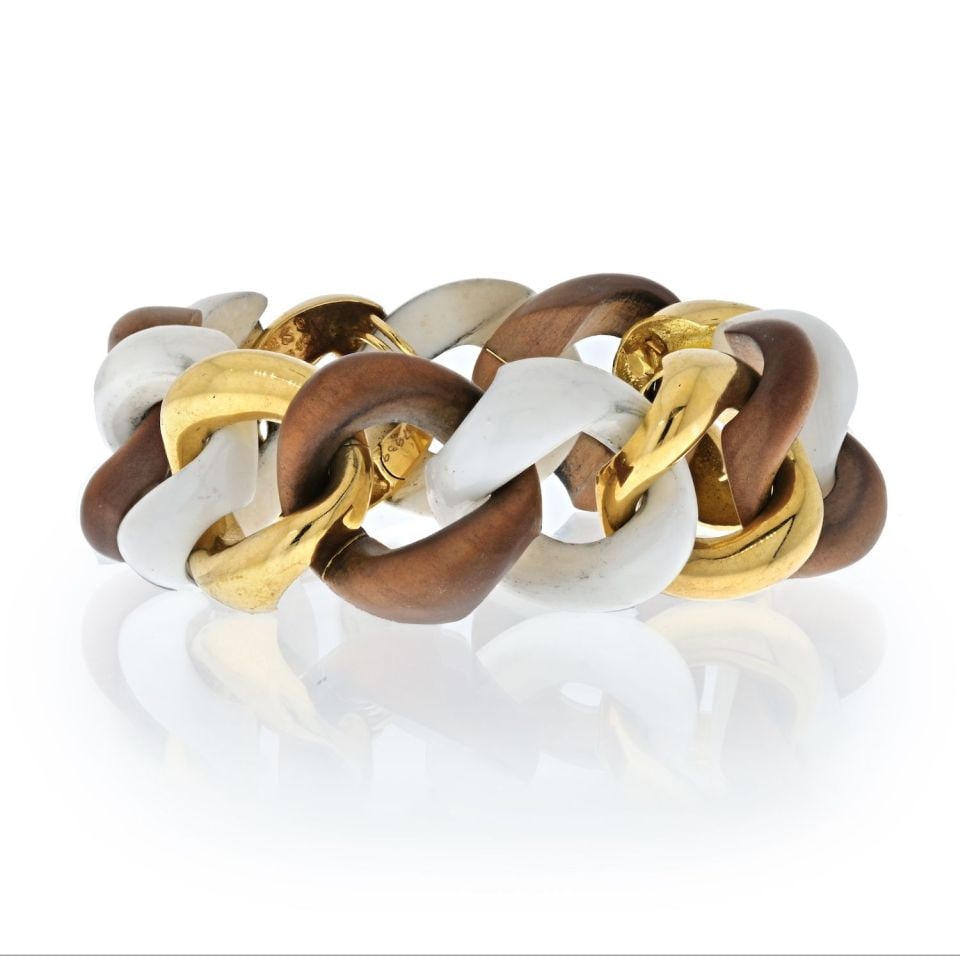 Chanel Seaman Schepps 18K Yellow Gold Walnut Wood Ceramic Link Bracelet: Chanel Seaman Schepps 18K Yellow Gold Walnut Wood Ceramic Link Bracelet This exquisite Seaman Schepps bracelet features a unique combination of 18K yellow gold, walnut wood, and white ceramic in a fas
