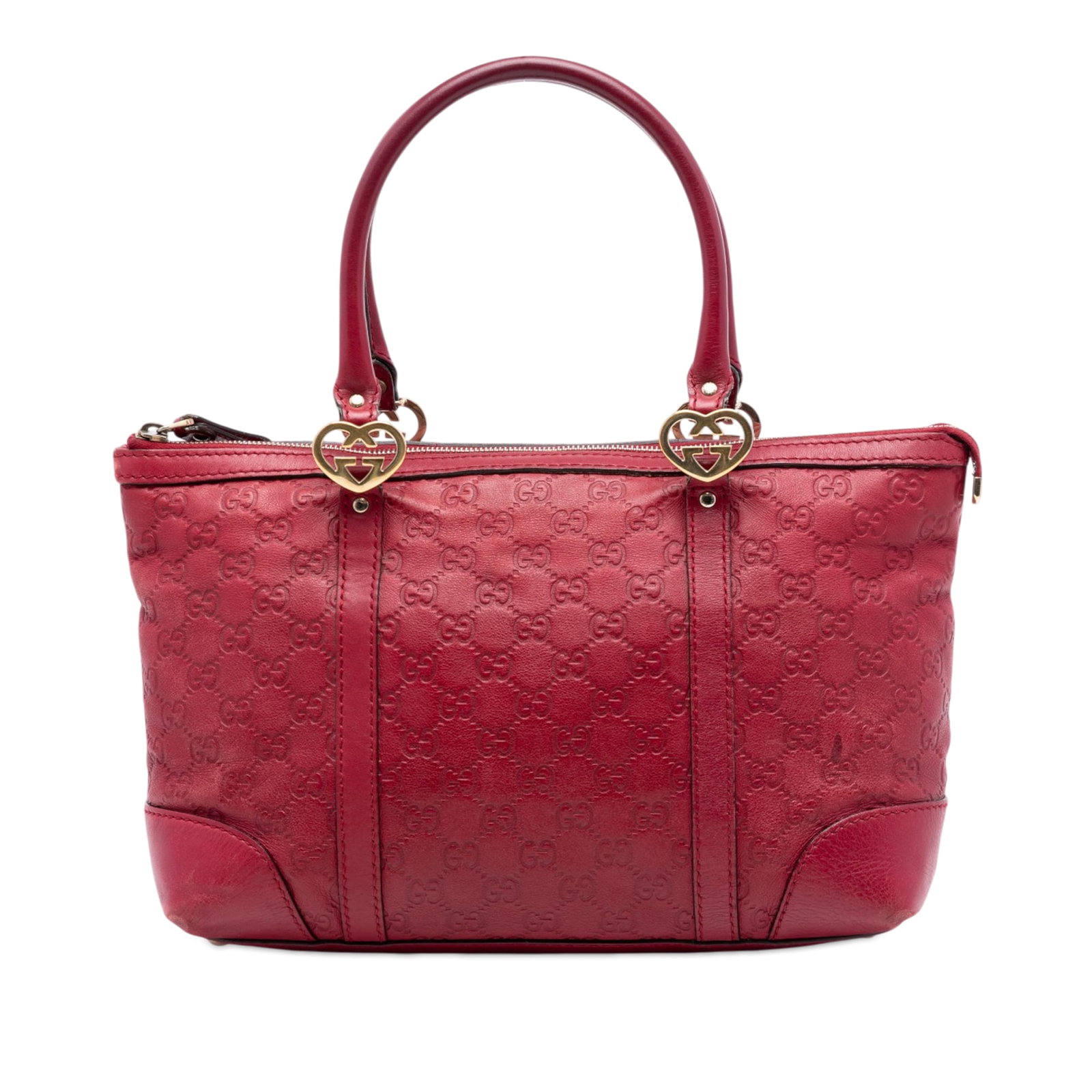 Gucci Guccissima Leather Tote Bag Lovely: Gucci Guccissima Leather Tote Bag Lovely This Guccissima Lovely Tote showcases an embossed leather body in red, complemented by rolled leather handles and a top zip closure. The interior is designed w