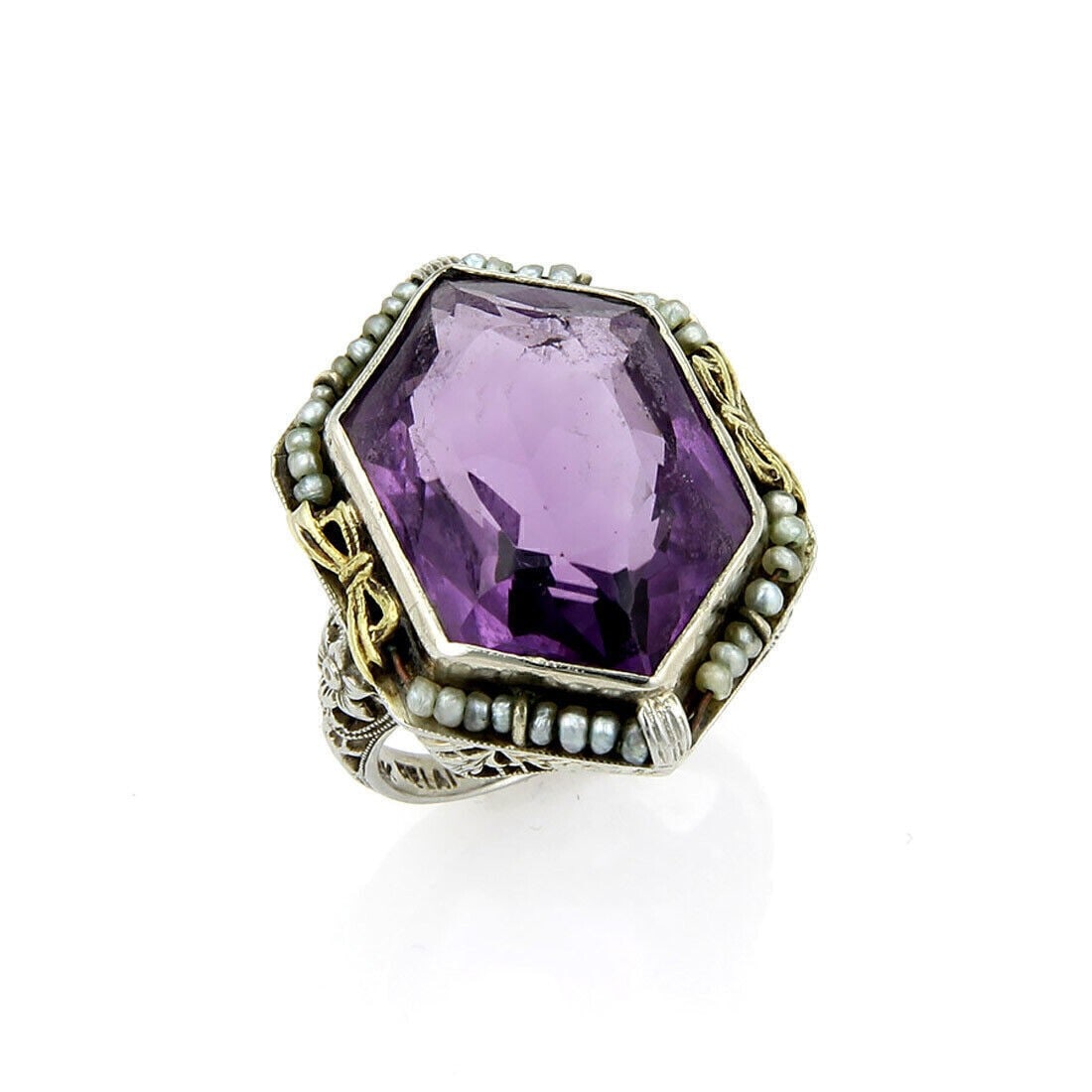 Art Deco 18k Two Tone Amethyst Seed Pearl Flower Ring Size 5.5: Art Deco 18k Two Tone Amethyst Seed Pearl Flower Ring Size 5.5 This vintage Art Deco ring features a striking amethyst gemstone accented by delicate seed pearls, all set in an intricate filigree flora