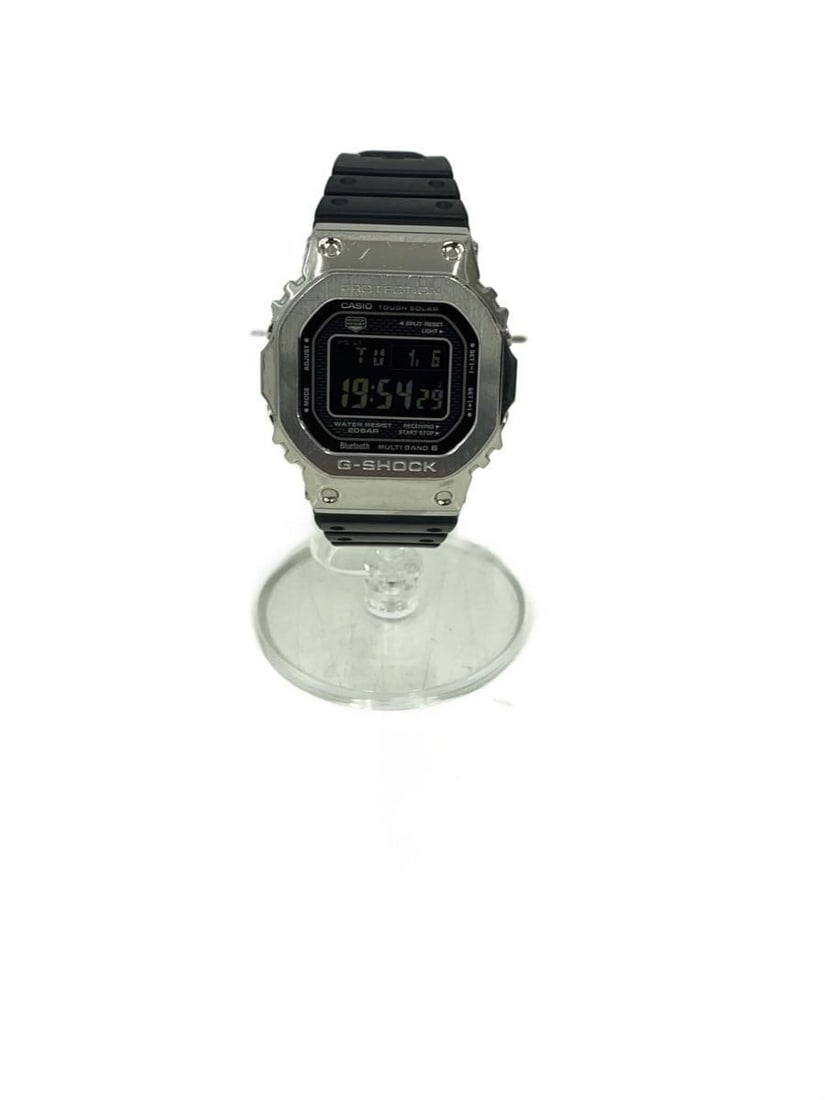 Casio G Shock GMW B5000 Men's Wristwatch: Casio G Shock GMW B5000 Men's Wristwatch This CASIO G-SHOCK GMW-B5000 men's wristwatch features a robust design and is crafted in Japan. The watch is pre-owned and graded as B, indicating slight signs