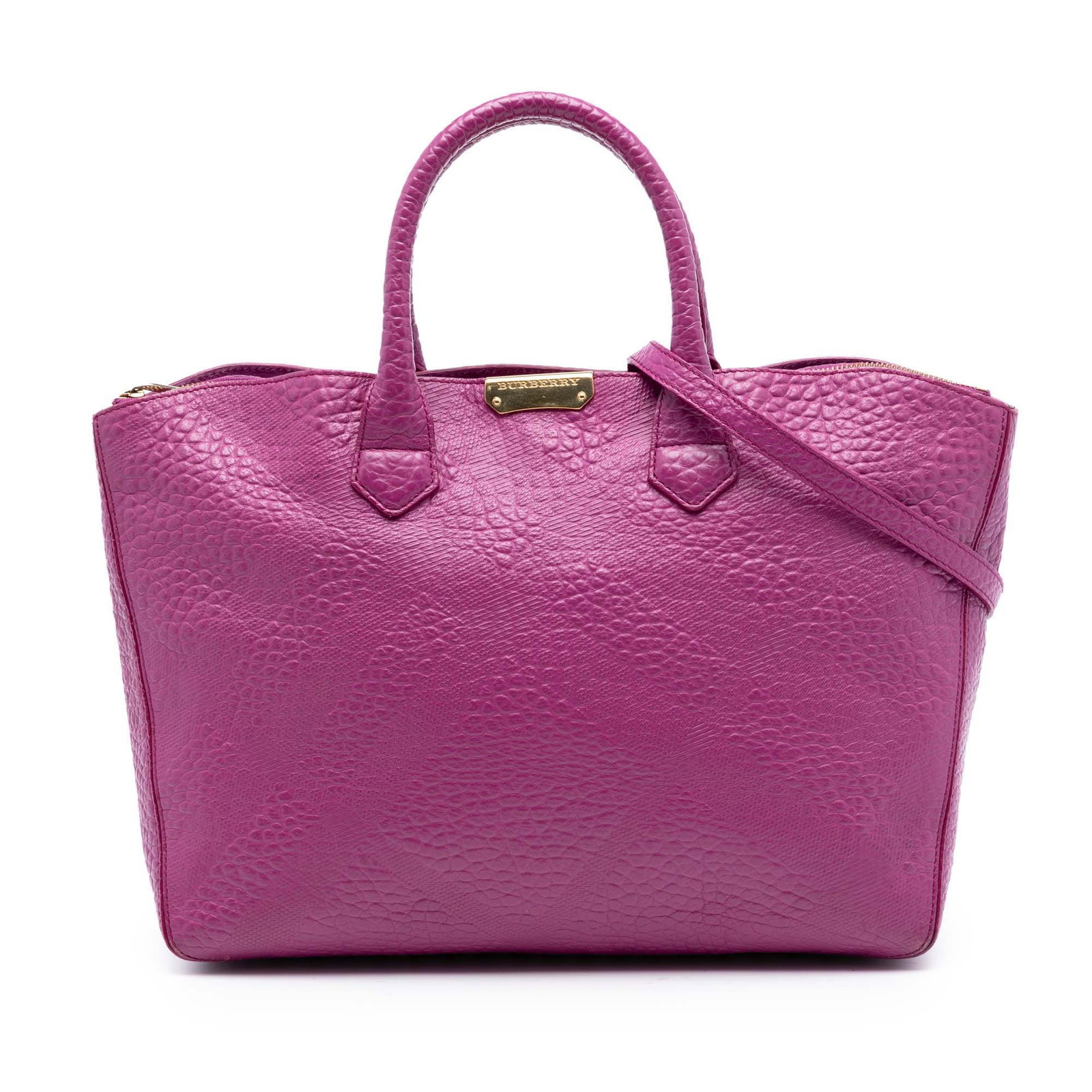 Burberry Dewsbury Purple Embossed Leather Satchel: Burberry Dewsbury Purple Embossed Leather Satchel This Burberry Dewsbury satchel is crafted from embossed leather in a striking purple hue. It features rolled leather handles, a detachable flat leathe