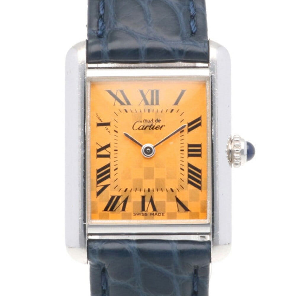 Cartier Must Tank Ladies Quartz Wristwatch Silver Dial Navy Leather: Cartier Must Tank Ladies Quartz Wristwatch Silver Dial Navy Leather This vintage Cartier Must Tank wristwatch features a silver dial and a navy leather strap, offering a classic and elegant design. Cr