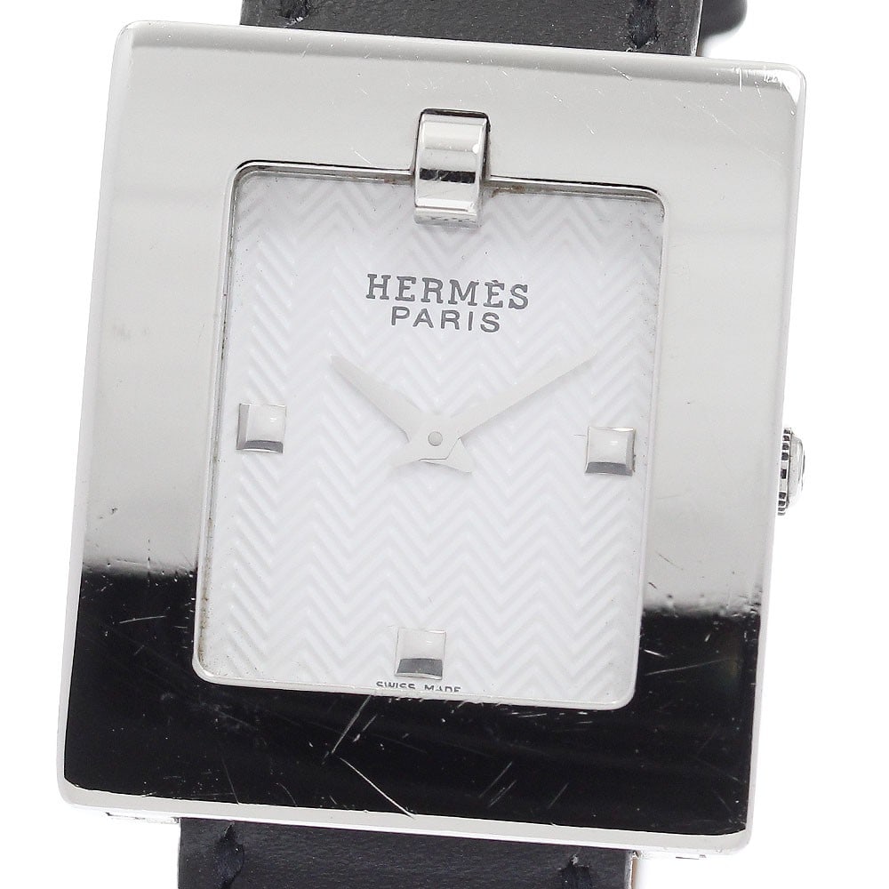 Hermes Band Watch BE1.210 Quartz Ladies Wristwatch: Hermes Band Watch BE1.210 Quartz Ladies Wristwatch This Hermes BE1.210 quartz wristwatch is designed for women and features a stainless steel case paired with a white dial and a leather bracelet. The 