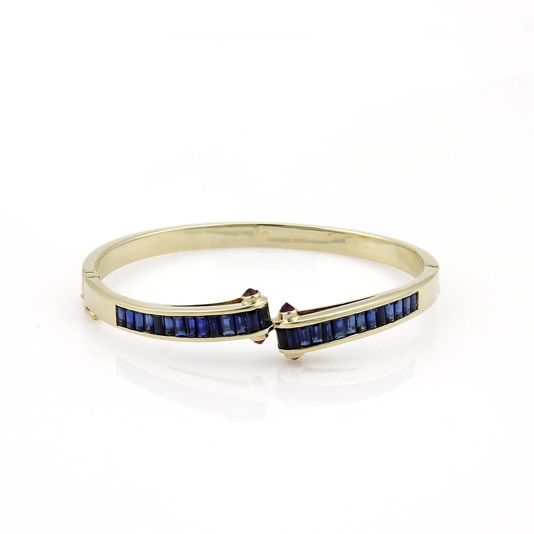 Estate 5.40ct Sapphire Ruby 14k Yellow Gold Bangle Bracelet Fancy Design: Estate 5.40ct Sapphire Ruby 14k Yellow Gold Bangle Bracelet Fancy Design This exquisite Estate bangle bracelet is elegantly crafted from 14k yellow gold, showcasing a polished finish. The bracelet fea