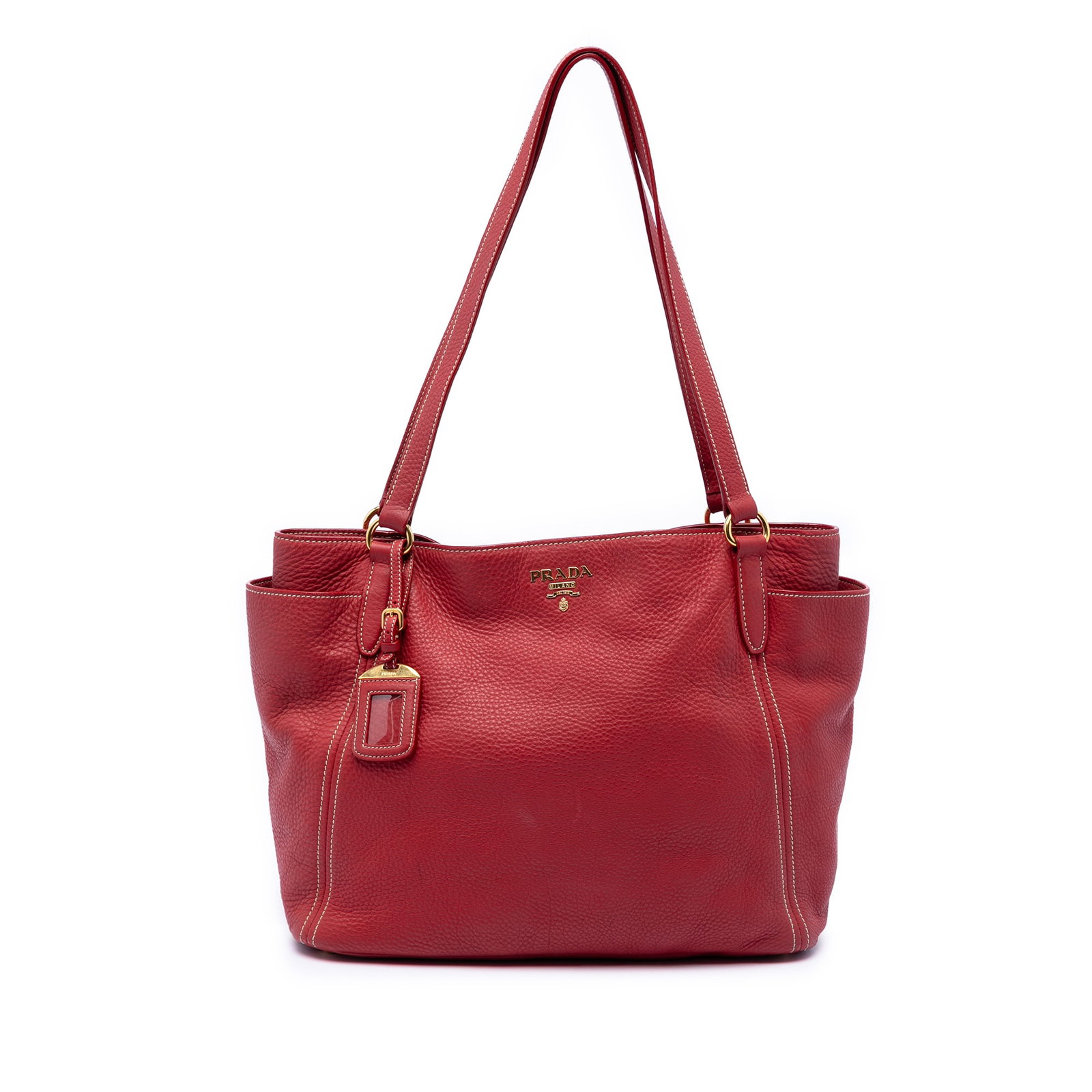 Prada Vitello Daino Leather Tote Bag with Double Exterior Pockets Red: Prada Vitello Daino Leather Tote Bag with Double Exterior Pockets Red This Prada Vitello Daino Double Pocket Tote features a red leather body with flat leather straps, an open top with magnetic closur