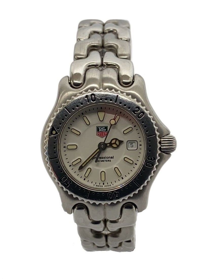 TAG Heuer WG1312-0 Women's Stainless Steel Quartz Wristwatch: TAG Heuer WG1312-0 Women's Stainless Steel Quartz Wristwatch This TAG Heuer Professional 200m Quartz WG1312-0 is a women's wristwatch crafted from stainless steel. It features a white color scheme and