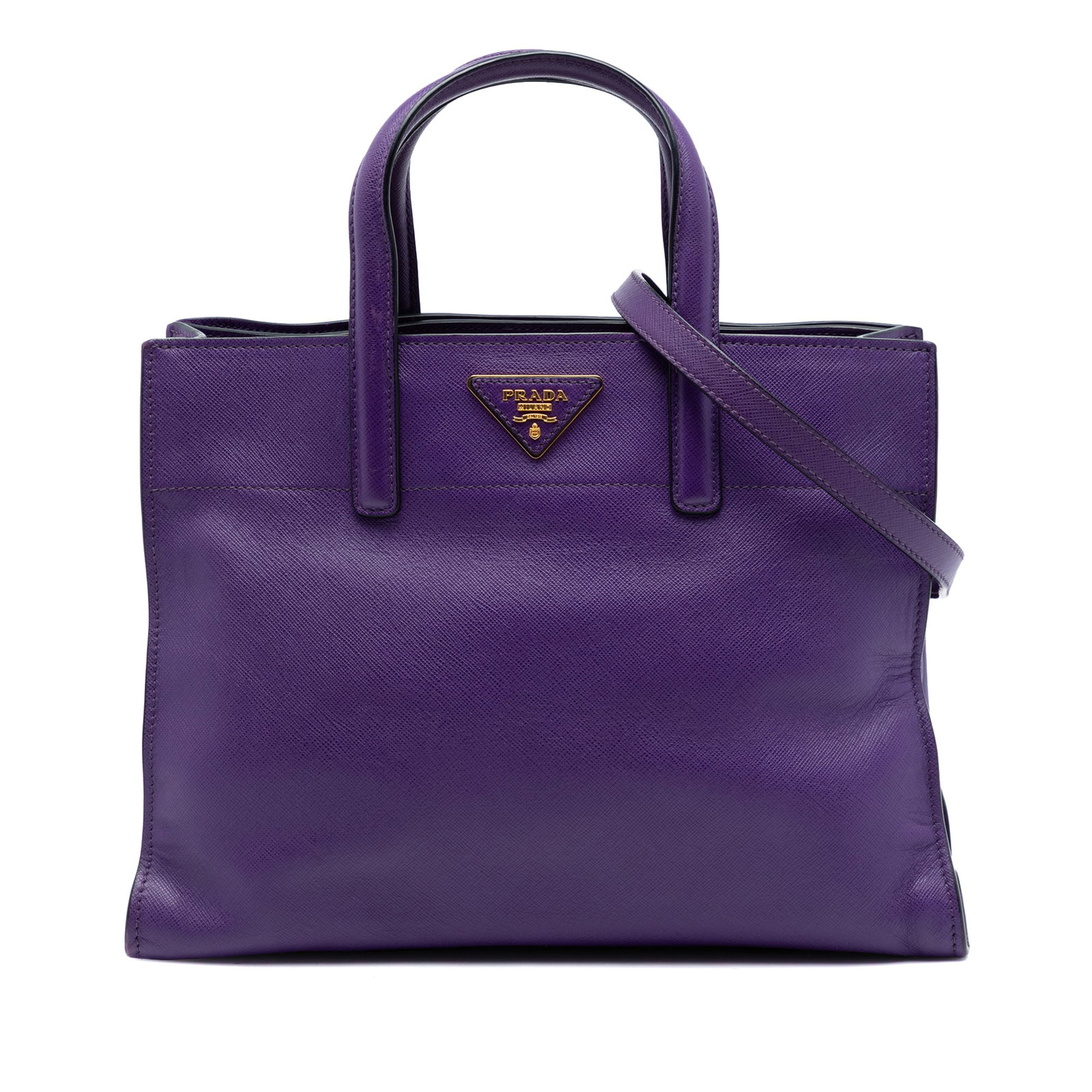 Prada purple leather tote with triple pockets: Prada purple leather tote with triple pockets This Prada Saffiano Soft Triple Pocket Tote is crafted from purple saffiano leather and features flat leather handles, a detachable and adjustable flat le